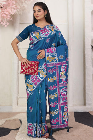 Teal Blue Ethnic Madhubani Print Silk Blend Saree Enhanced With Tassel Pallu Accents