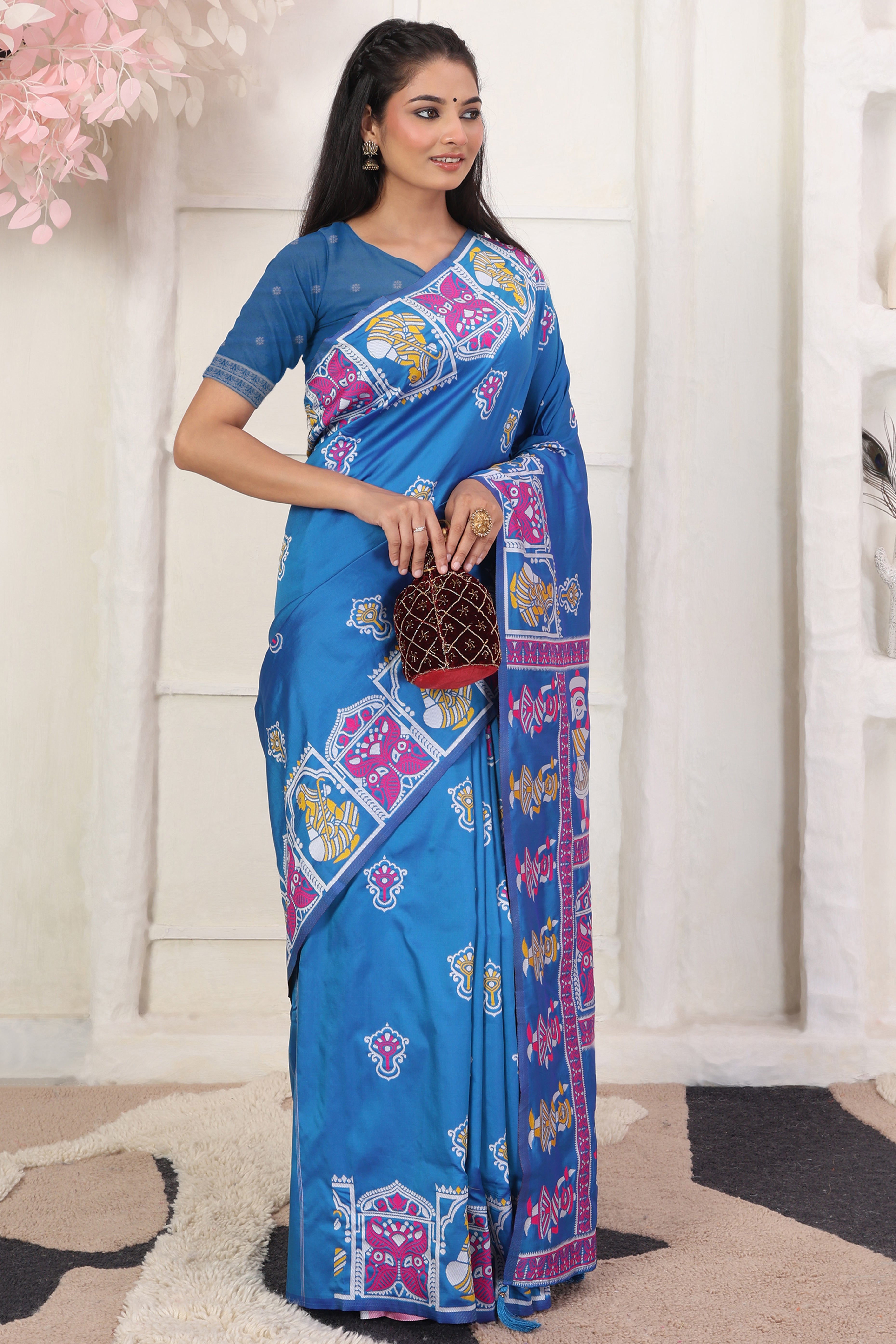 Blue Ethnic Madhubani Print Silk Blend Saree Enhanced With Tassel Pallu Accents