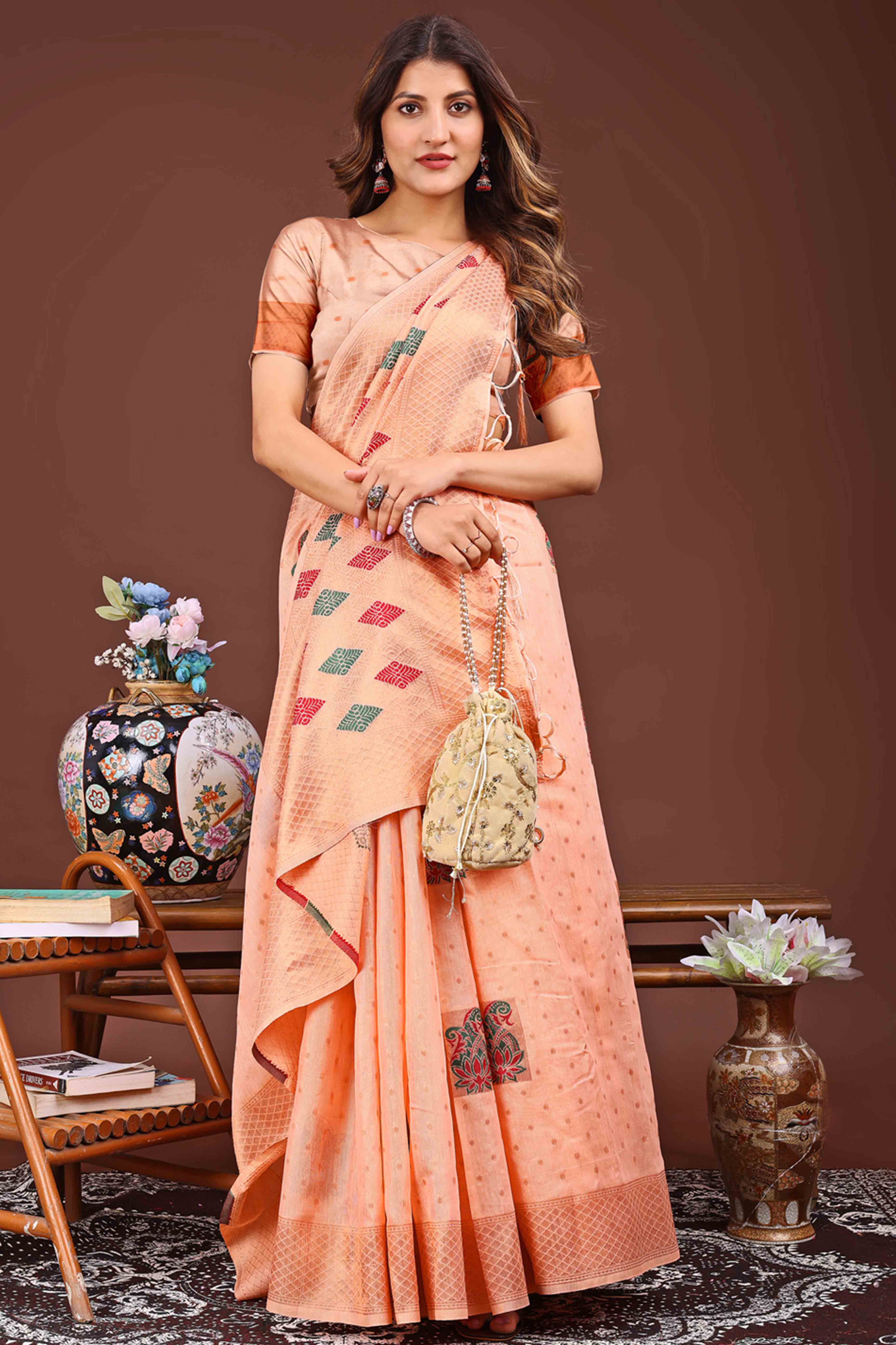 Light Orange Floral Zari Weaving Linen Cotton Saree With Tassel Pallu Accent