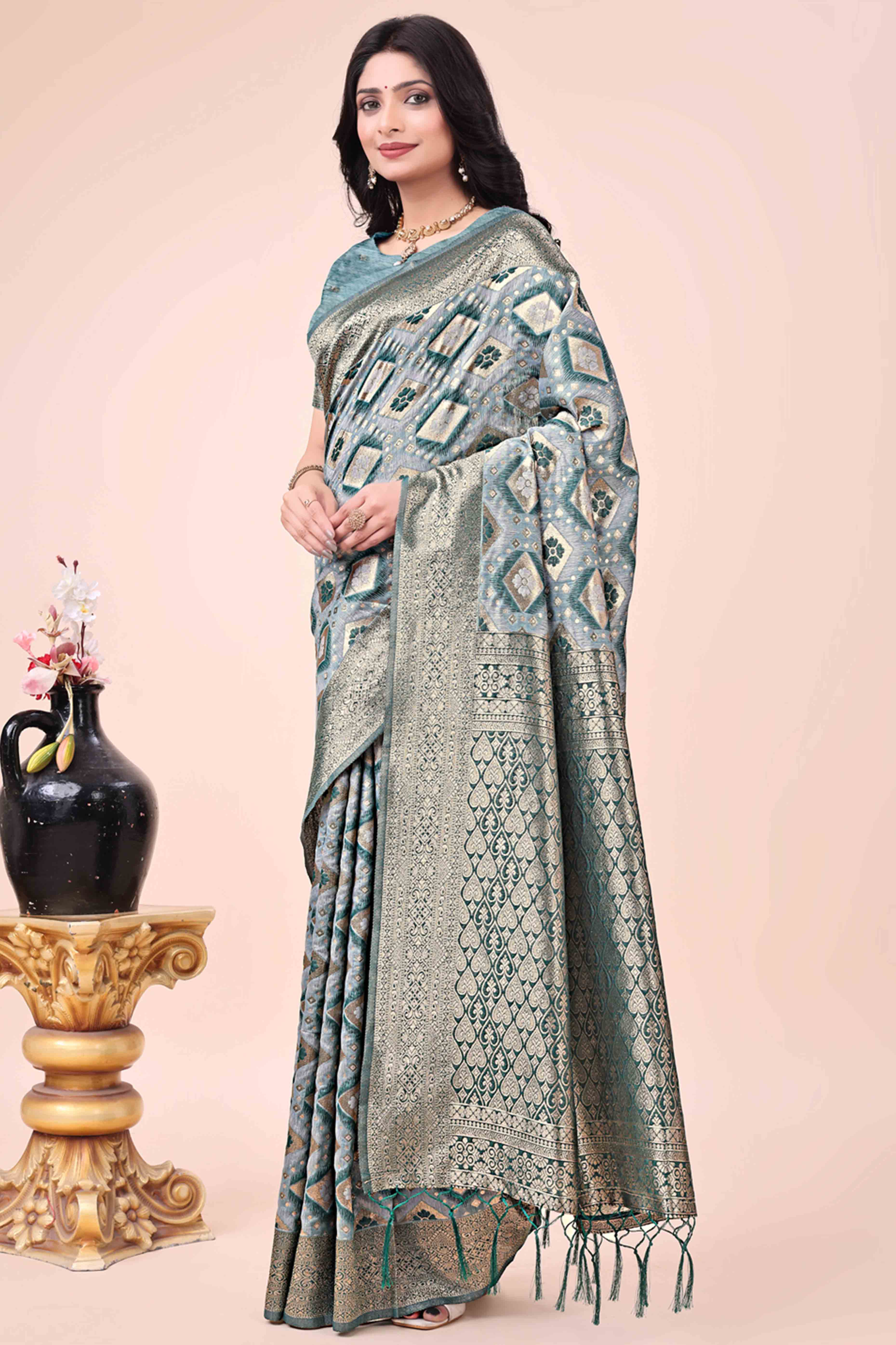 Floral Weaving On Green Cotton Blend Saree With Tassels