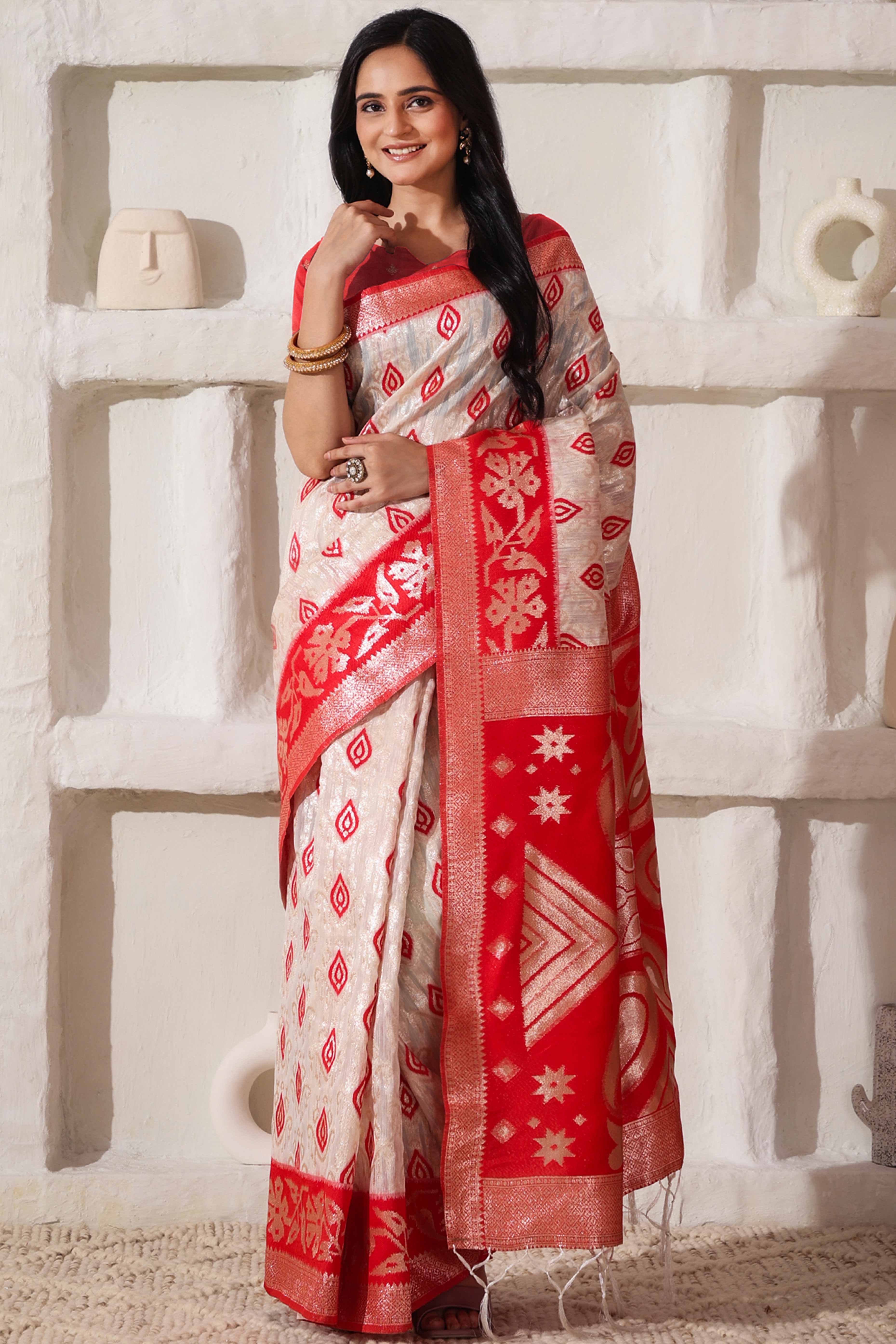 Classic White & Red Saree In Linen Cotton With Rich Zari Weaving And Tassel Accents