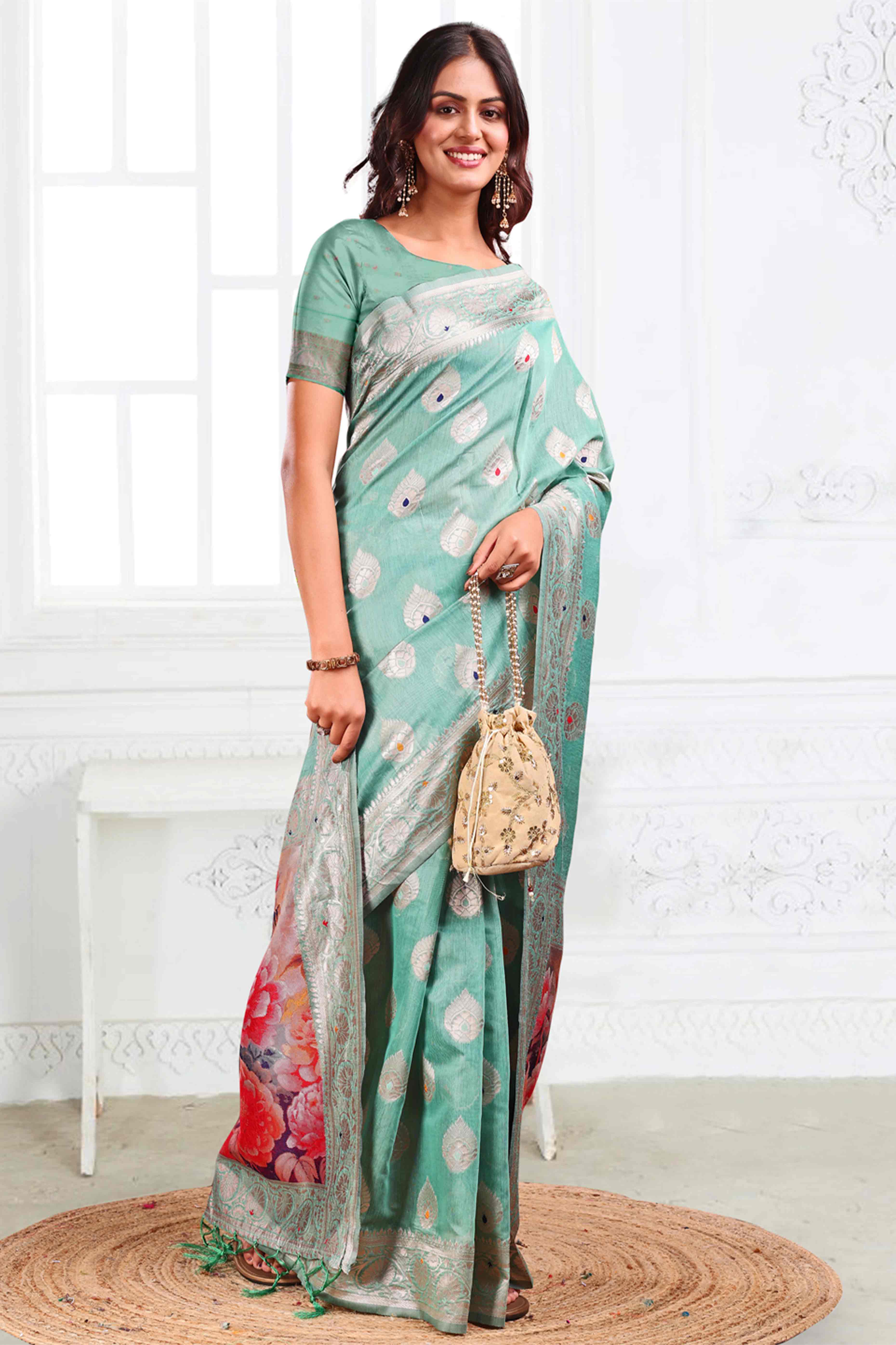 Turquoise Linen Cotton Silk Saree Adorned With Intricate Floral Zari Weaving & Tassel Pallu