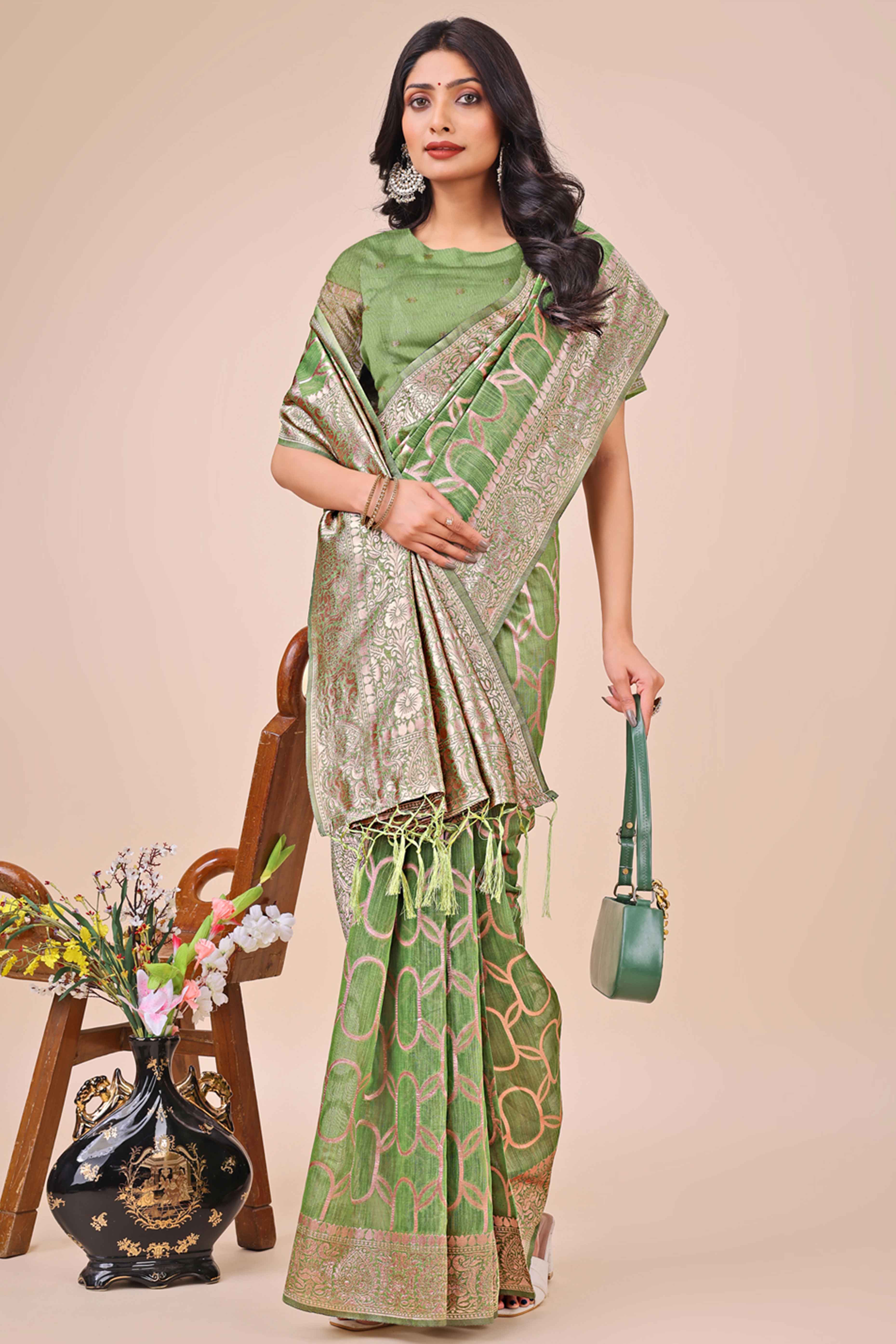 Green Linen Cotton Saree With Floral Zari Weaving & Delicate Tassel Border