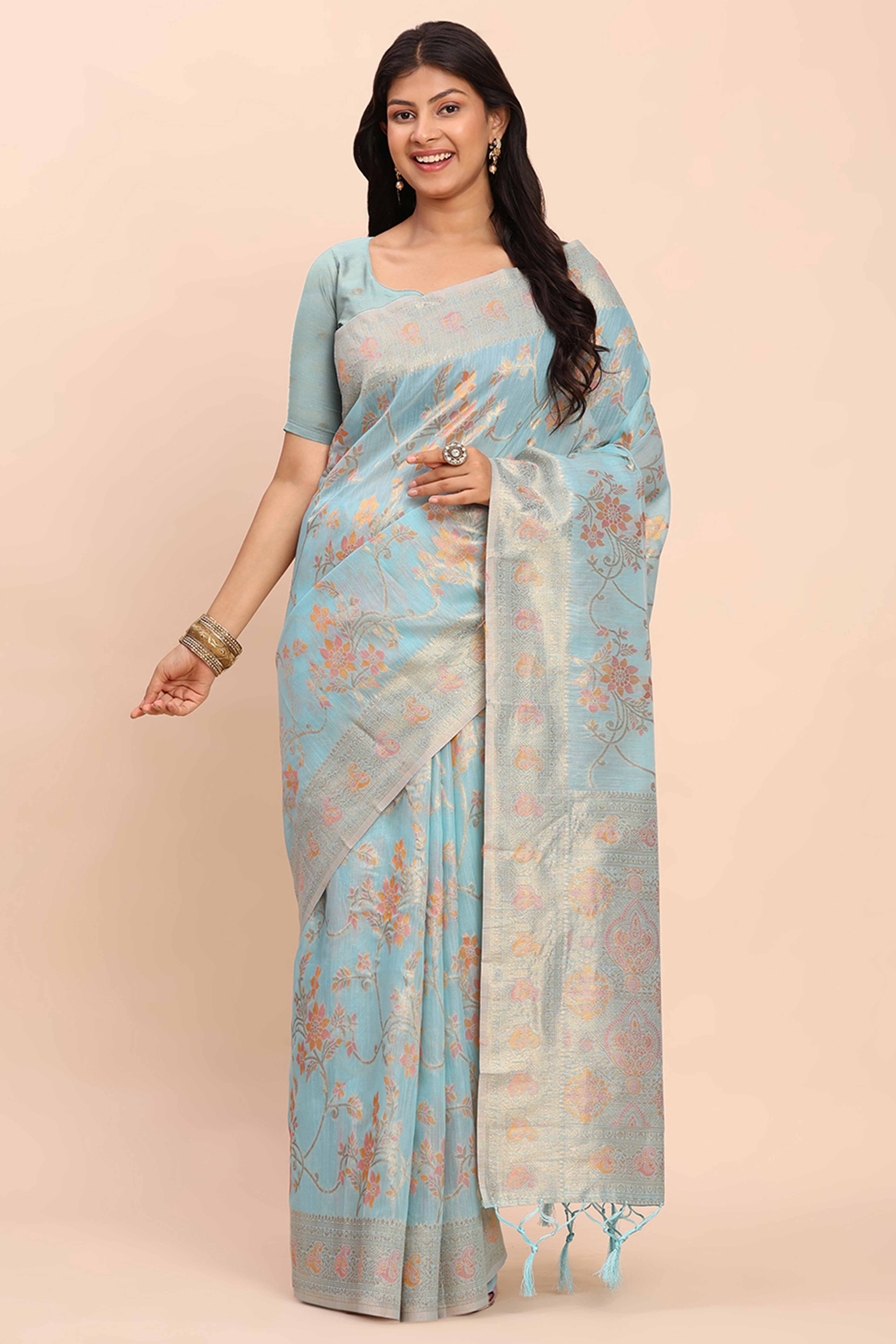 Sky Blue Linen Cotton Saree Showcasing Floral Zari Weaves & A Tasselled Finish Pallu