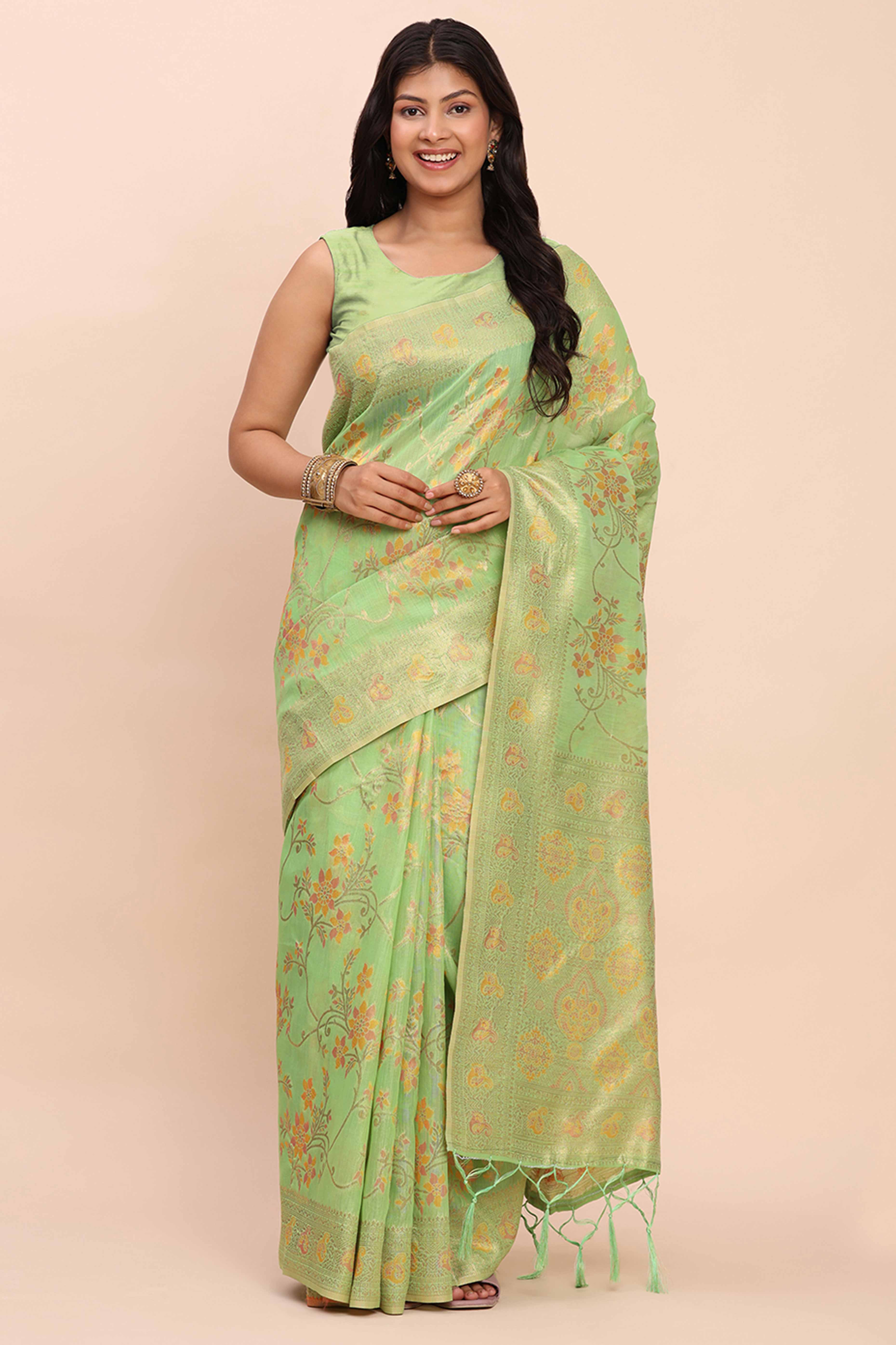 Green Linen Cotton Saree Showcasing Floral Zari Weaves & A Tasselled Finish Pallu