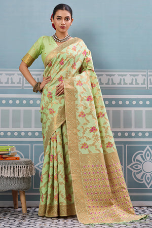 Majestic Bloom Pista Green Floral Zari Weaving Silk Blend Saree With Elegant Tassel Pallu