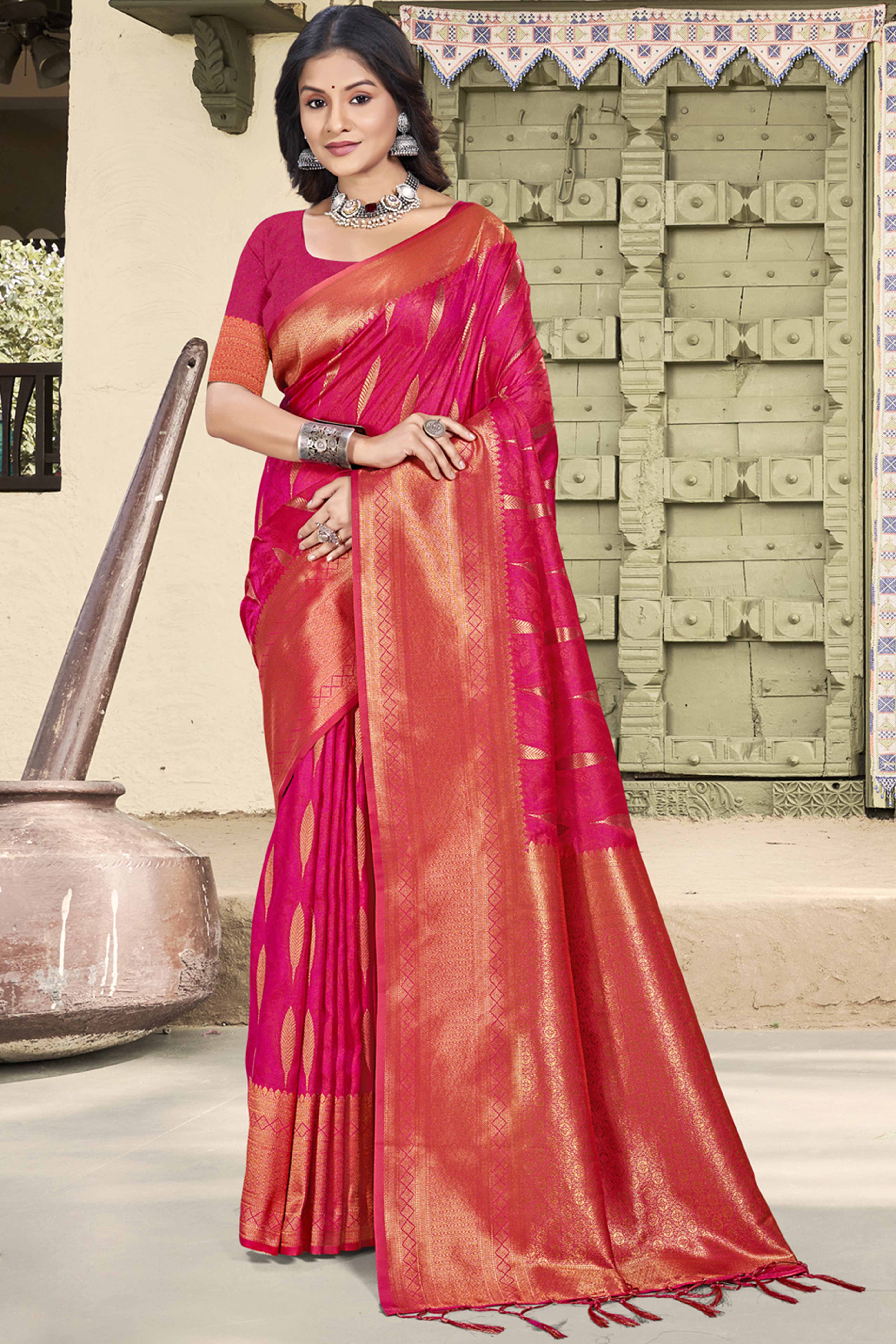 Charming Rani Pink Floral Zari Weaving Saree In Lustrous Silk Blend With Tassel Detail