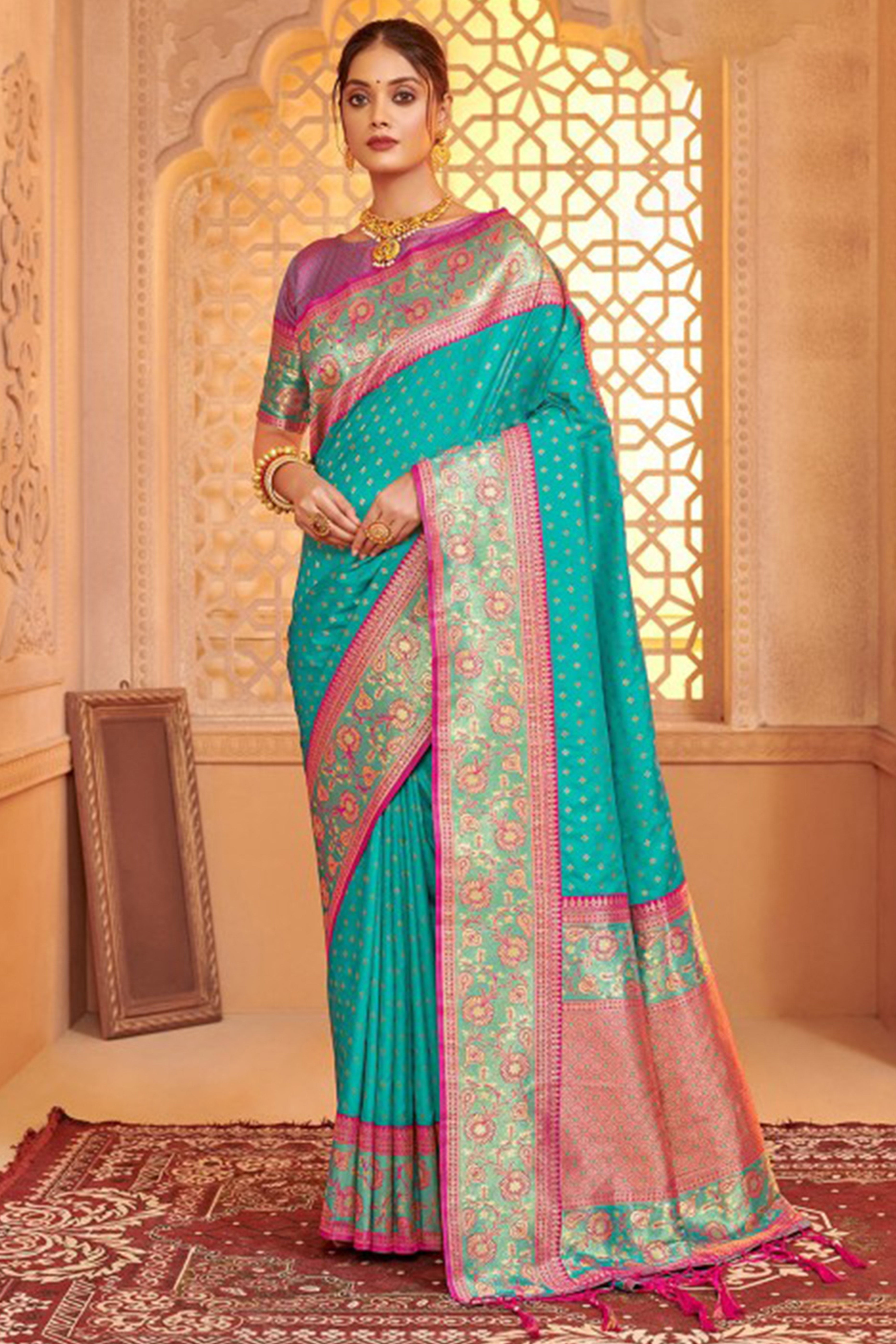 Elegant Turquoise Floral Zari Weaving Silk Blend Saree With Tassel Pallu