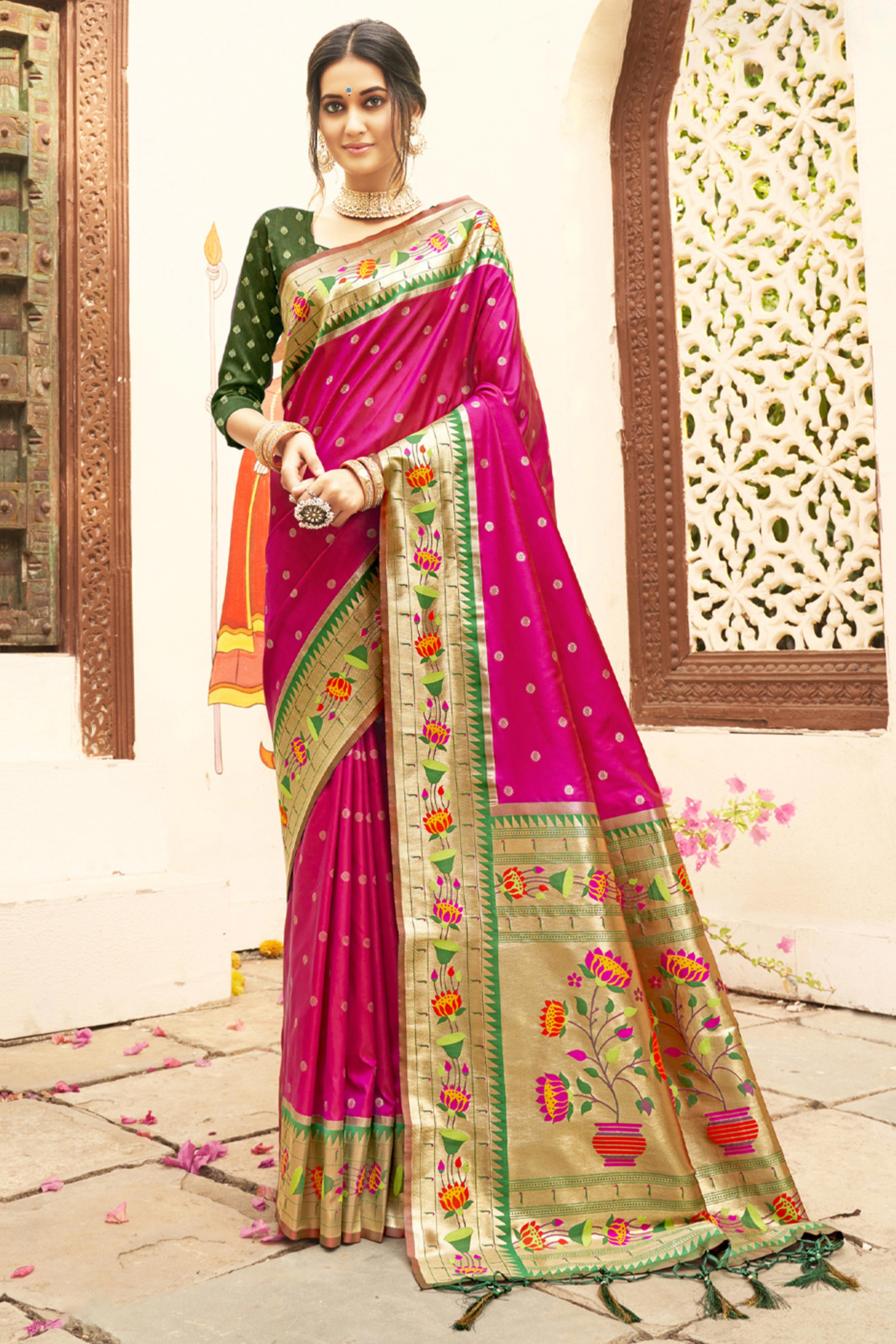 Charming Magenta Floral Zari Woven Silk Blend Saree With Stylish Tassel Pallu