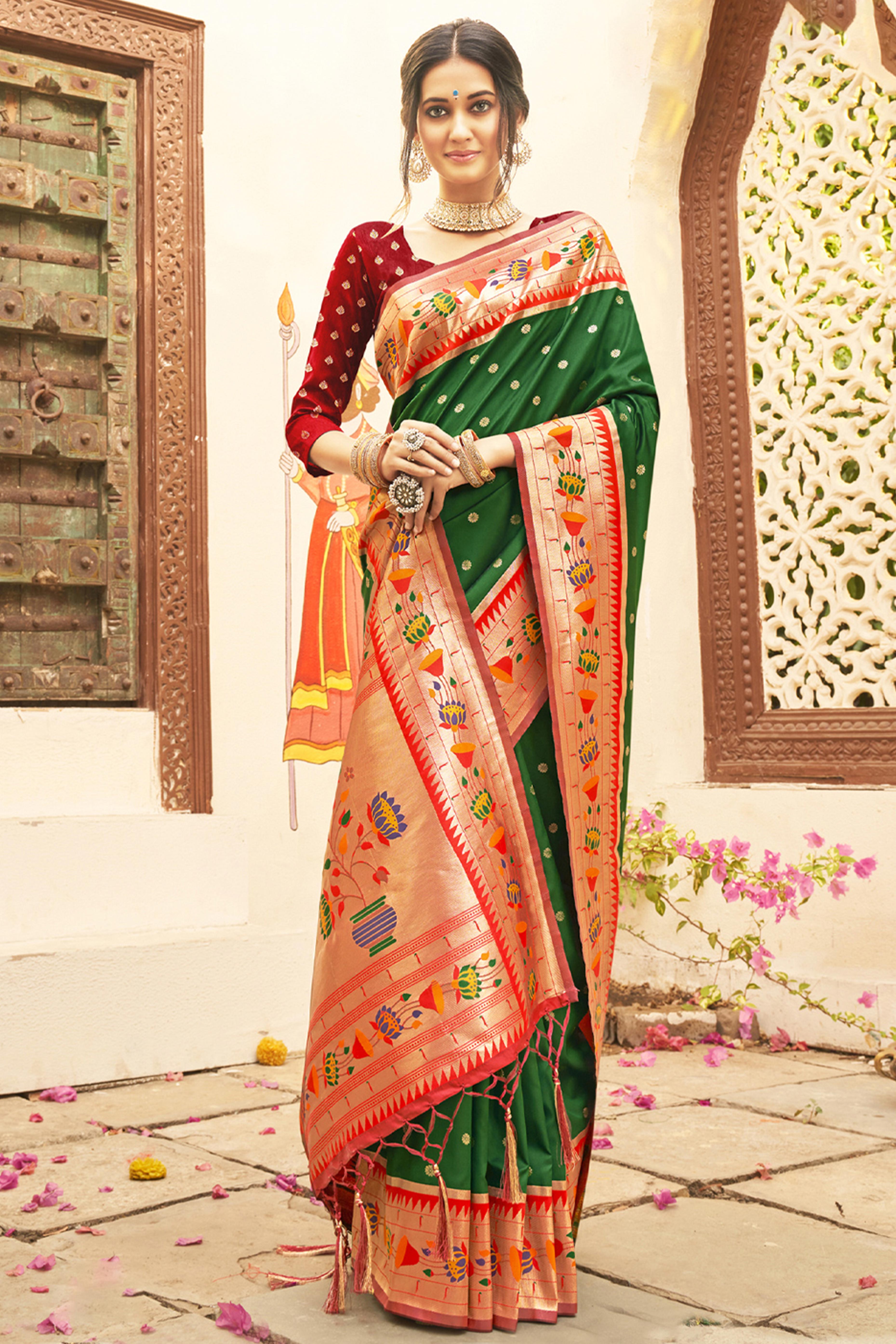 Charming Green Floral Zari Woven Silk Blend Saree With Stylish Tassel Pallu