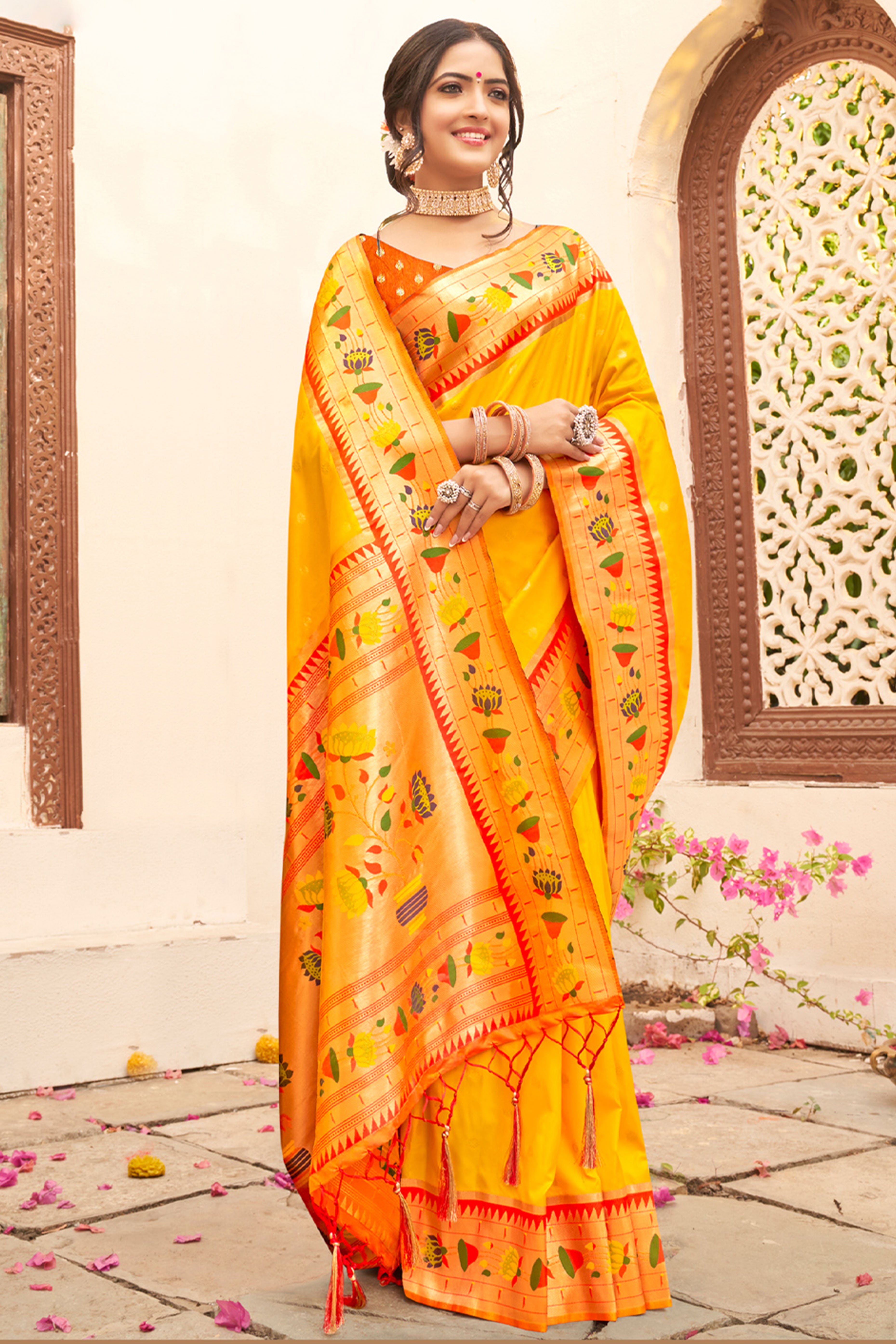 Charming Yellow Floral Zari Woven Silk Blend Saree With Stylish Tassel Pallu