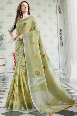 Pista Green Linen Saree with Intricate Floral Embroidery and Classic Weaving