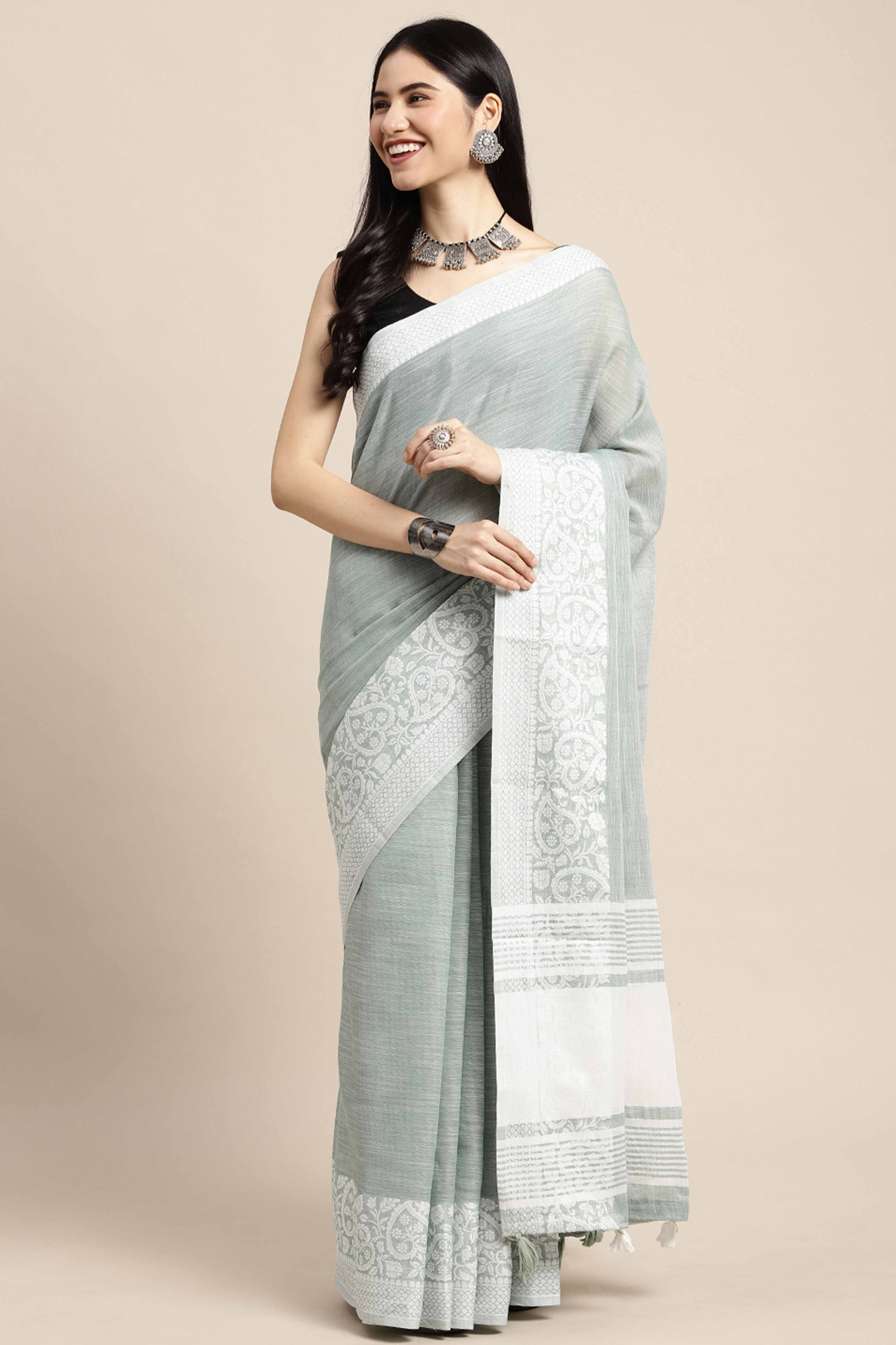 Sea Green Festive Linen Weaving Saree with Silver Zari Border & Pallu