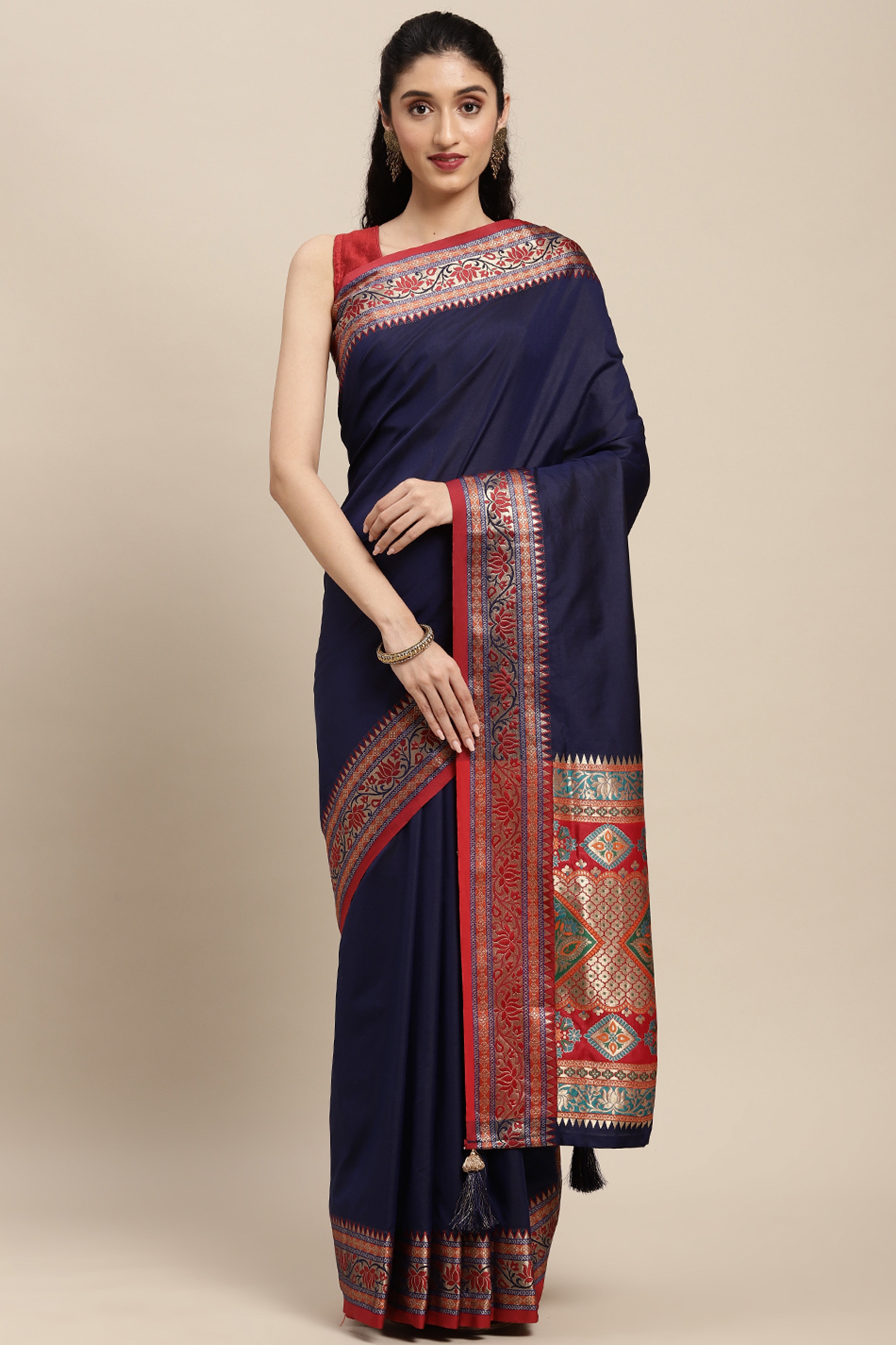 Graceful Navy Blue Solid Saree Highlighted With Floral Zari Weaving On Silk Blend & Tassel Pallu