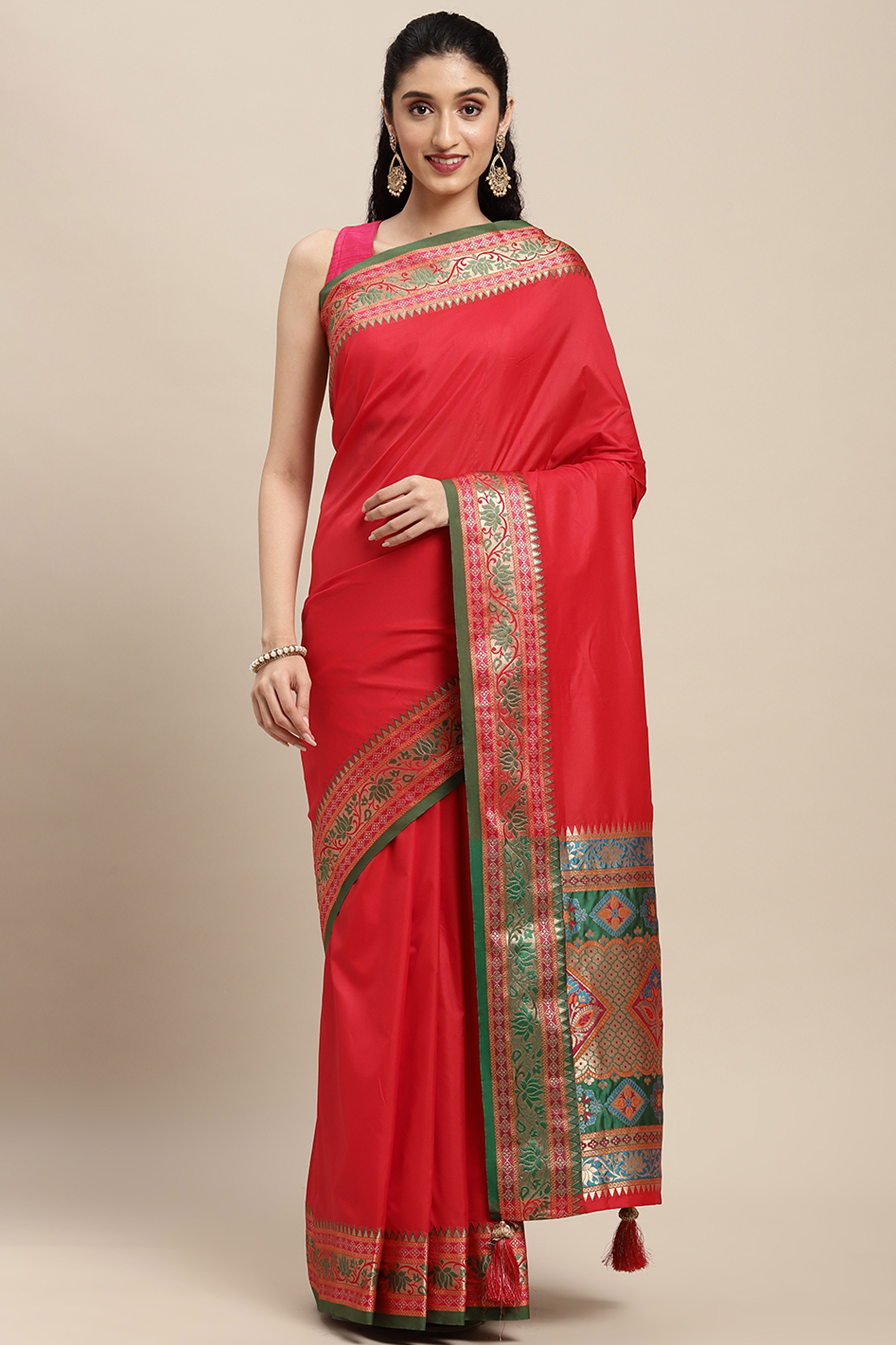 Graceful Red Solid Saree Highlighted With Floral Zari Weaving On Silk Blend & Tassel Pallu