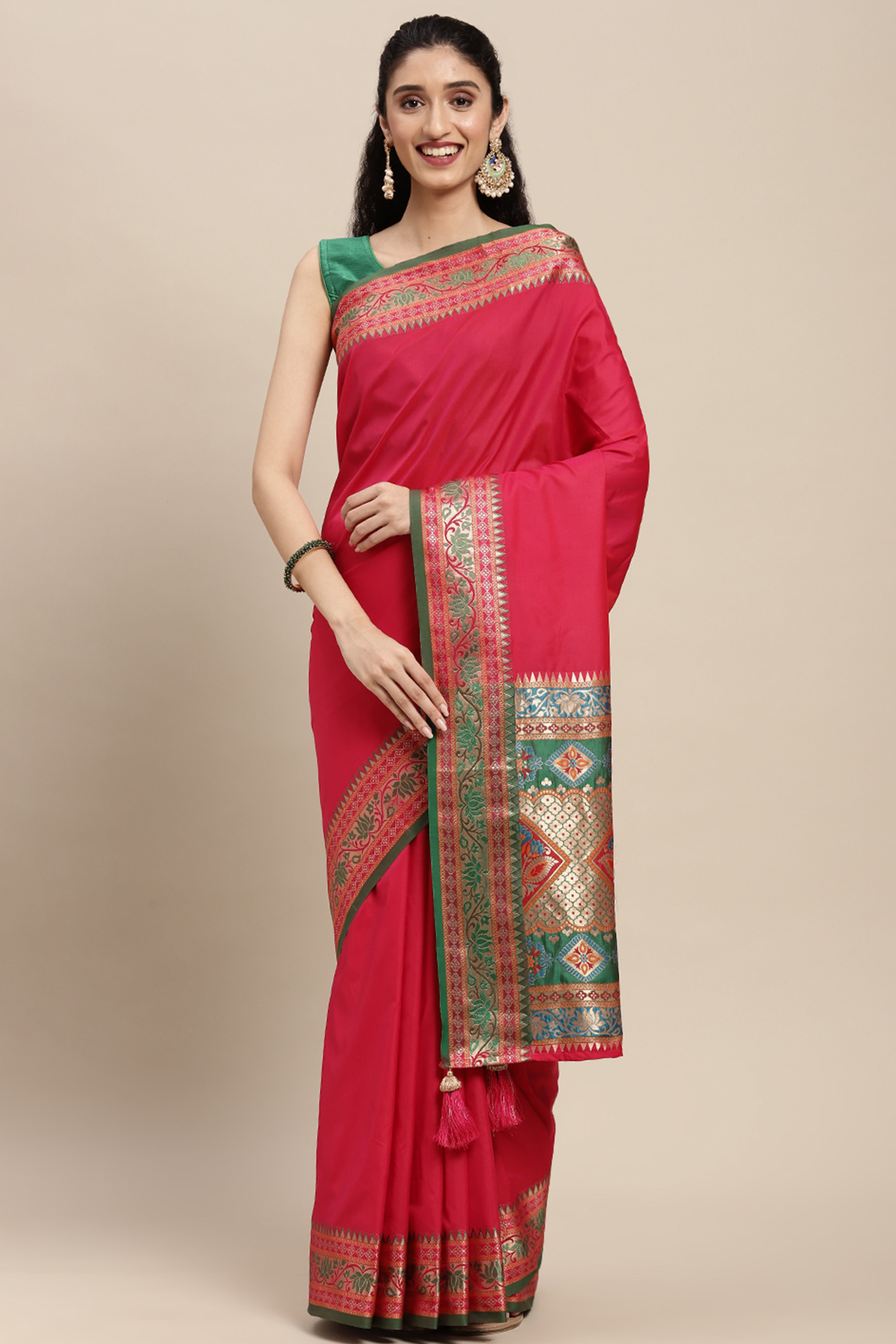 Graceful Pink Solid Saree Highlighted With Floral Zari Weaving On Silk Blend & Tassel Pallu