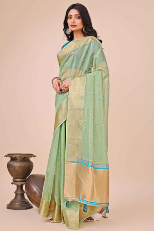 Pista Green Organza Saree Adorned With Fine Zari Weaving & Stylish Tassel Edging