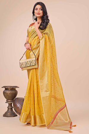 Yellow Organza Saree Adorned With Fine Zari Weaving & Stylish Tassel Edging