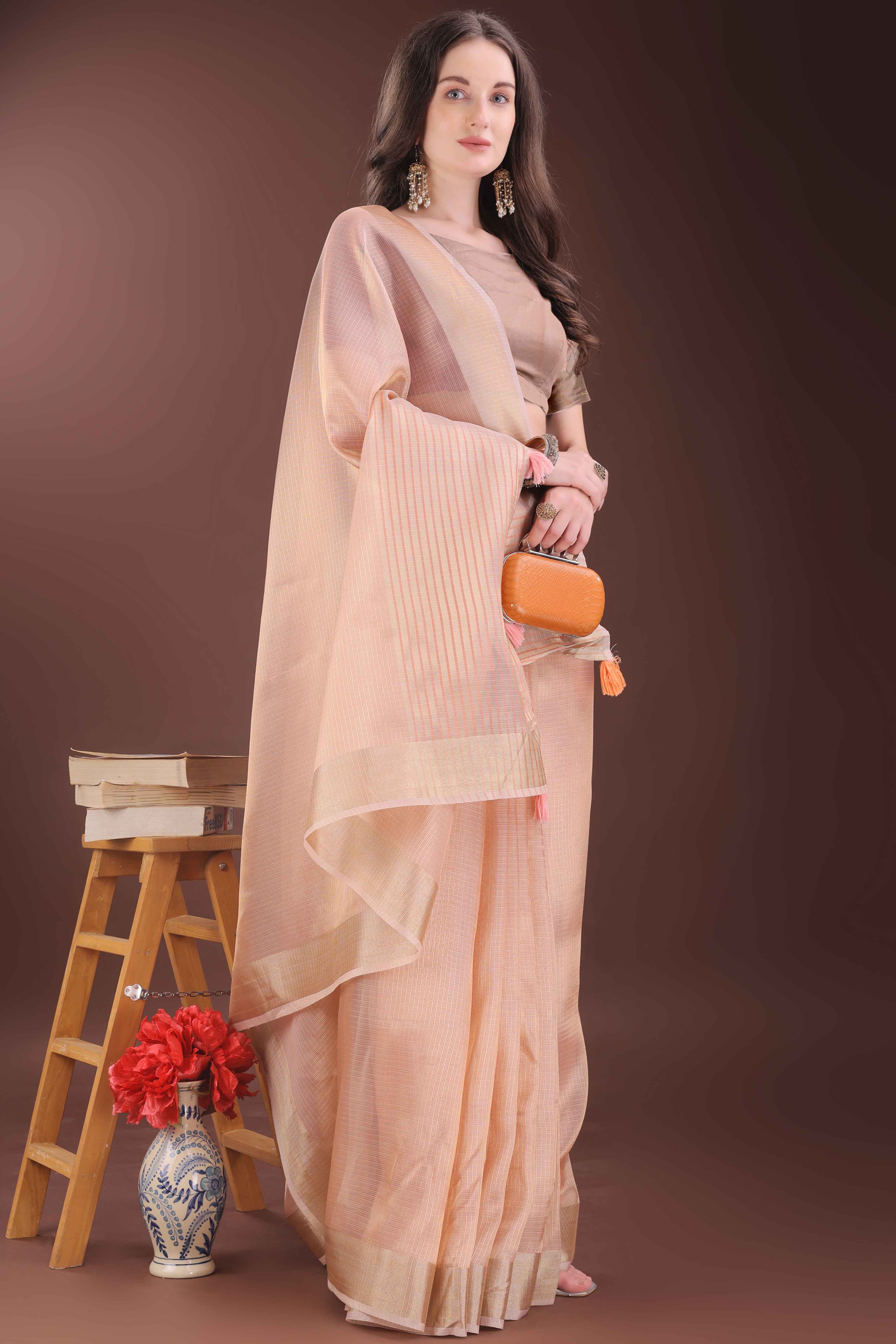 Peach Zari Woven Organza Saree With Graceful Tassel Border
