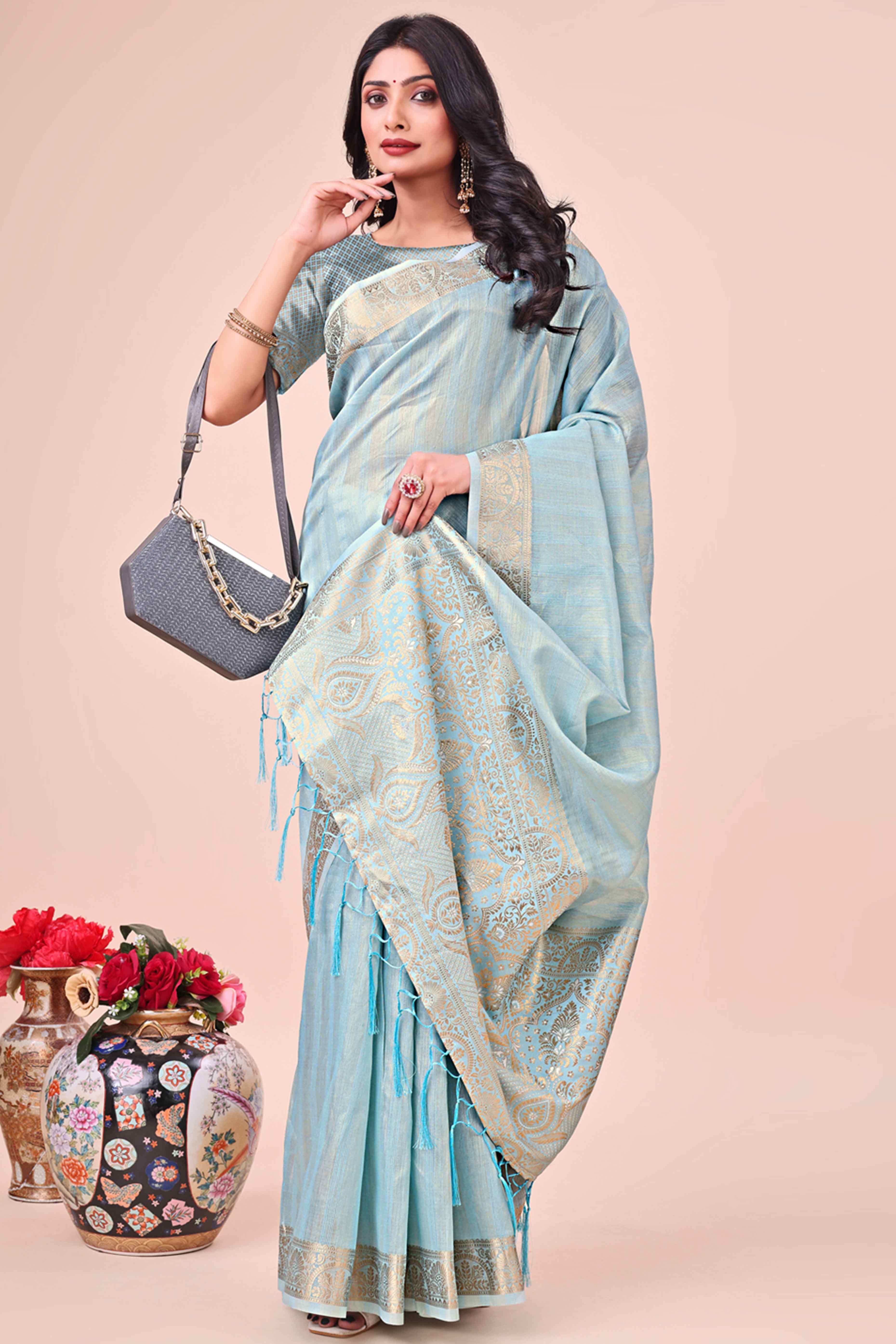 Sky Blue Organza Saree With Floral Zari Weave & Tassel Accents