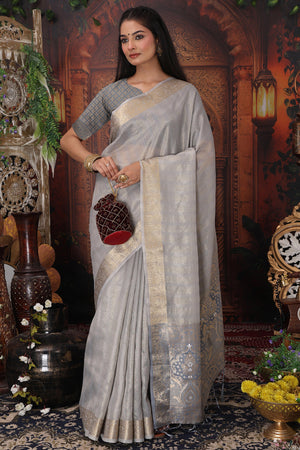 Grey Organza Saree Adorned With Floral Zari Weaving & Graceful Tassel Pallu