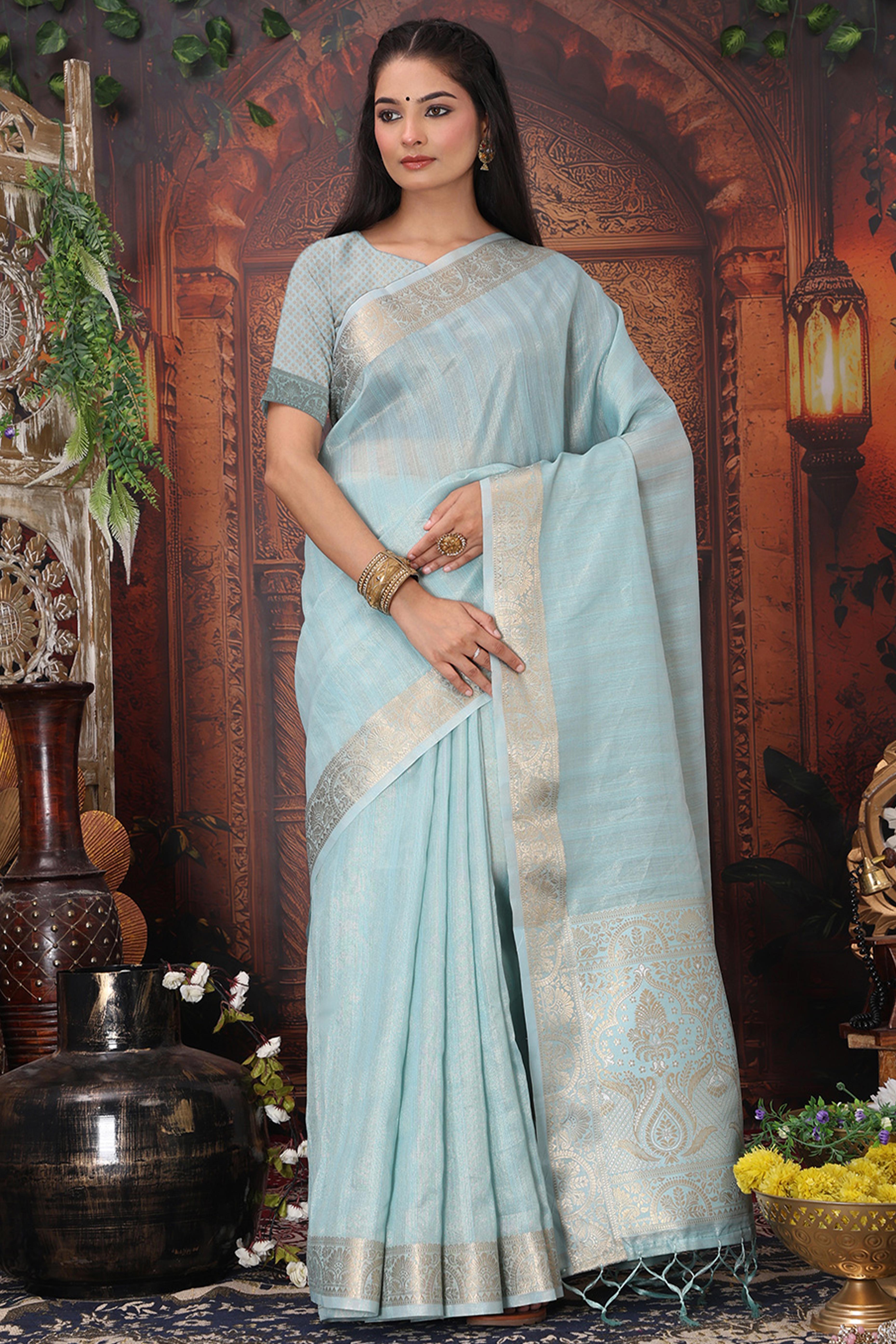 Sky Blue Organza Saree Adorned With Floral Zari Weaving & Graceful Tassel Pallu