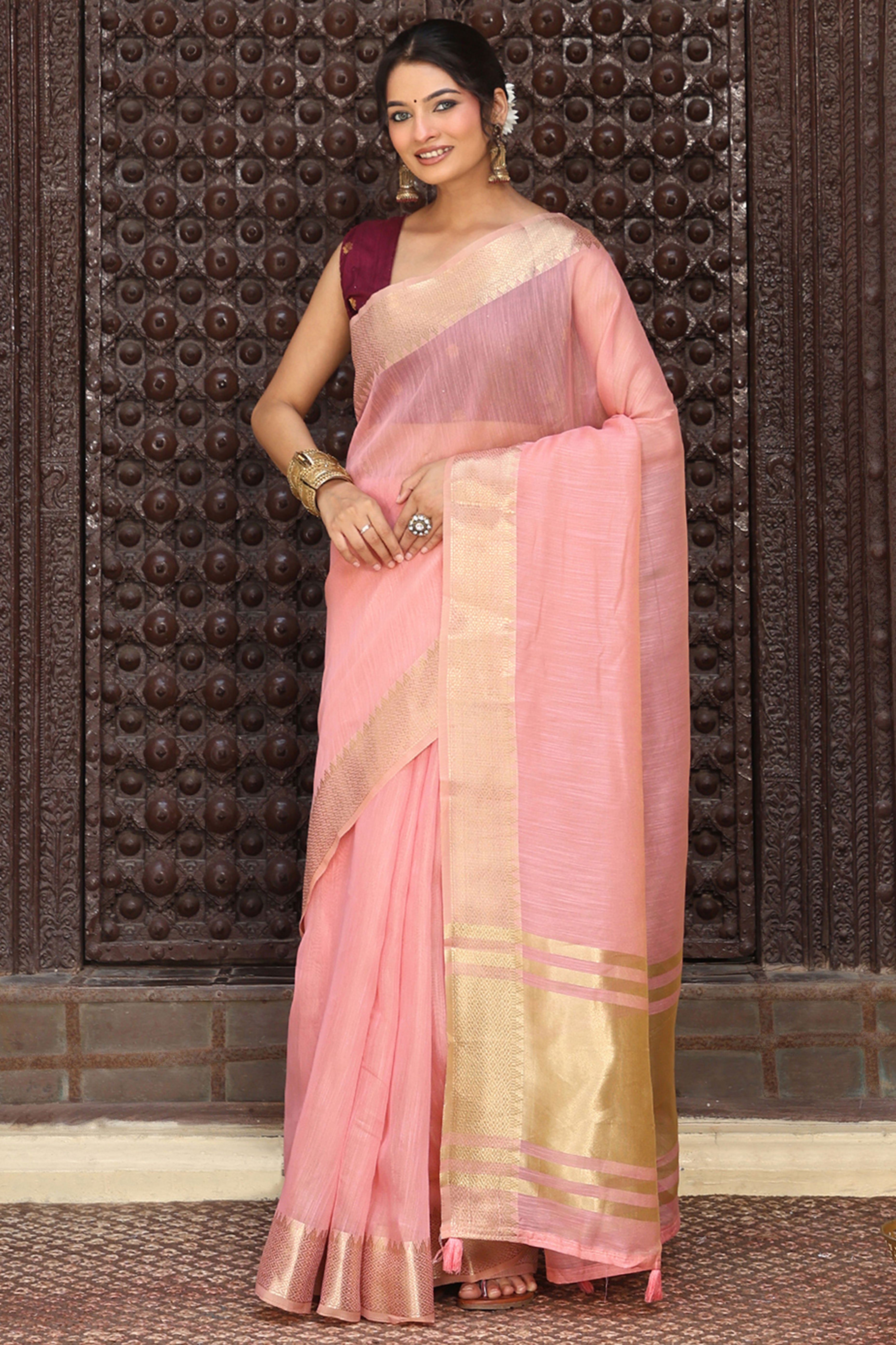 Trendy Pink Cotton Blend Saree Showcasing Elegant Zari Weaving & Tassel Border Pallu