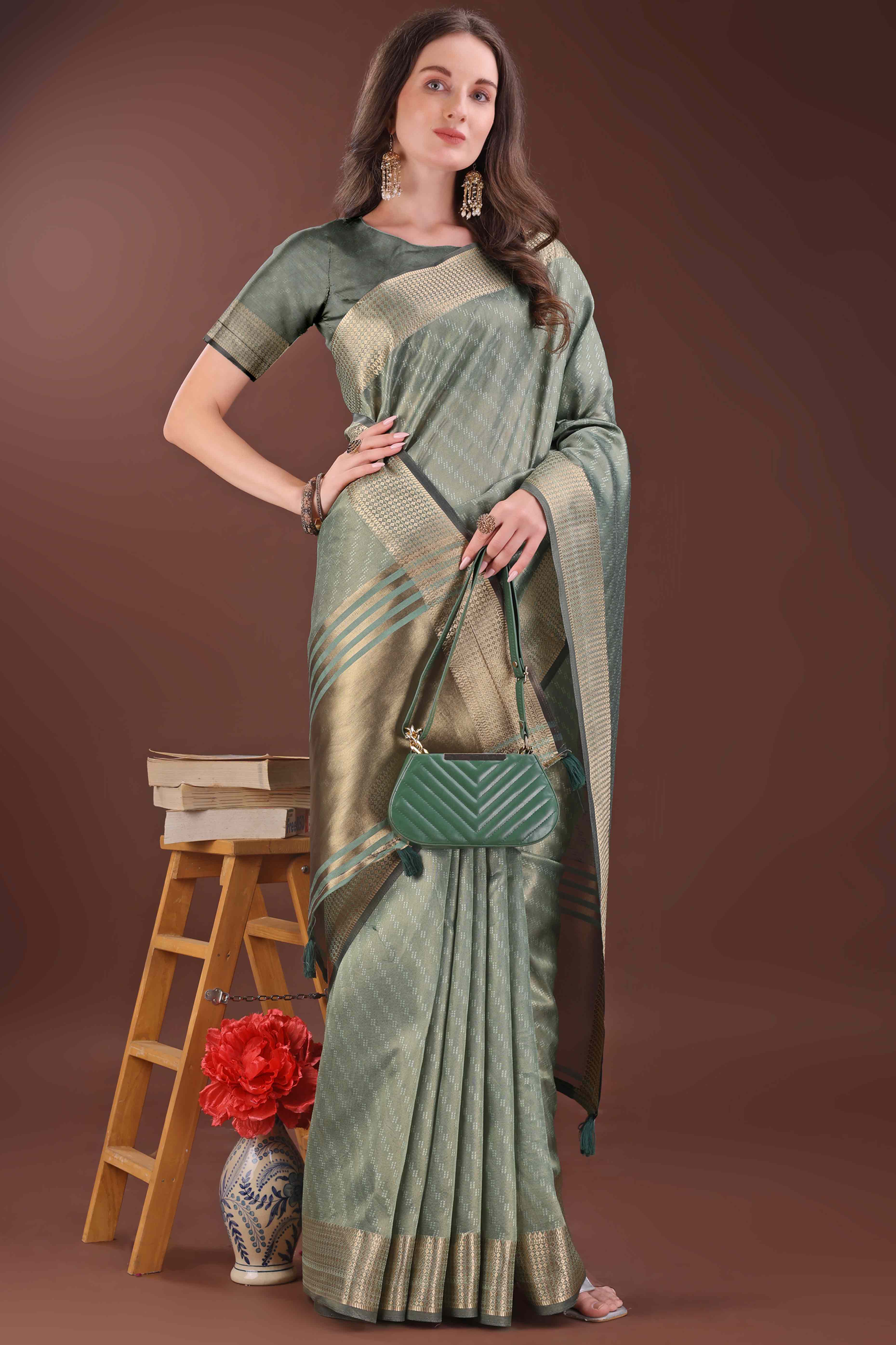 Green Zari Weaving Organza Saree With Tassel Border