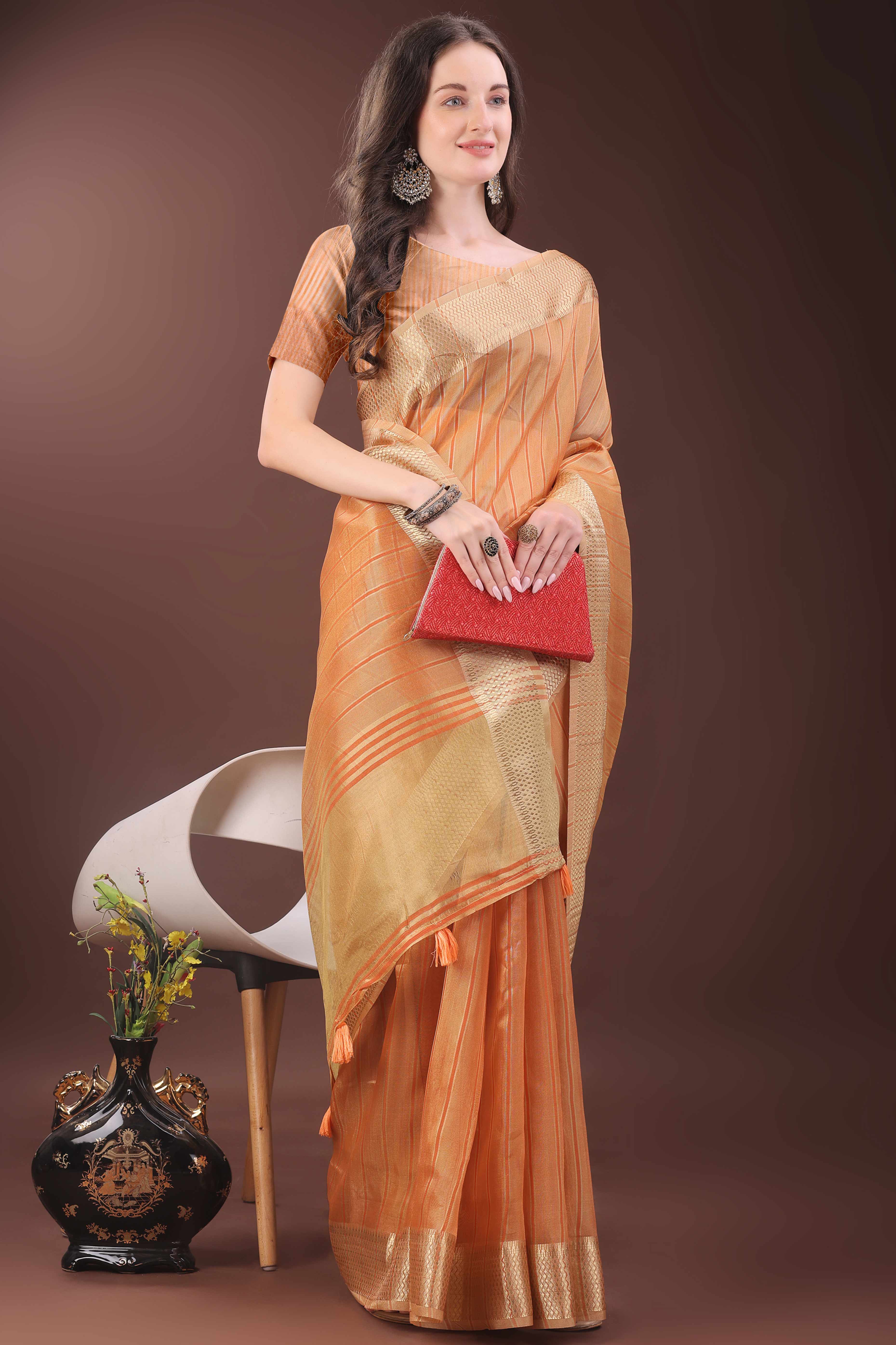 Orange Organza Saree With Zari Woven Stripes & Elegant Tassel Border