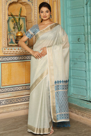 Minimalist Cream Linen Saree with Elegant Blue Pallu in Handloom Weave Look