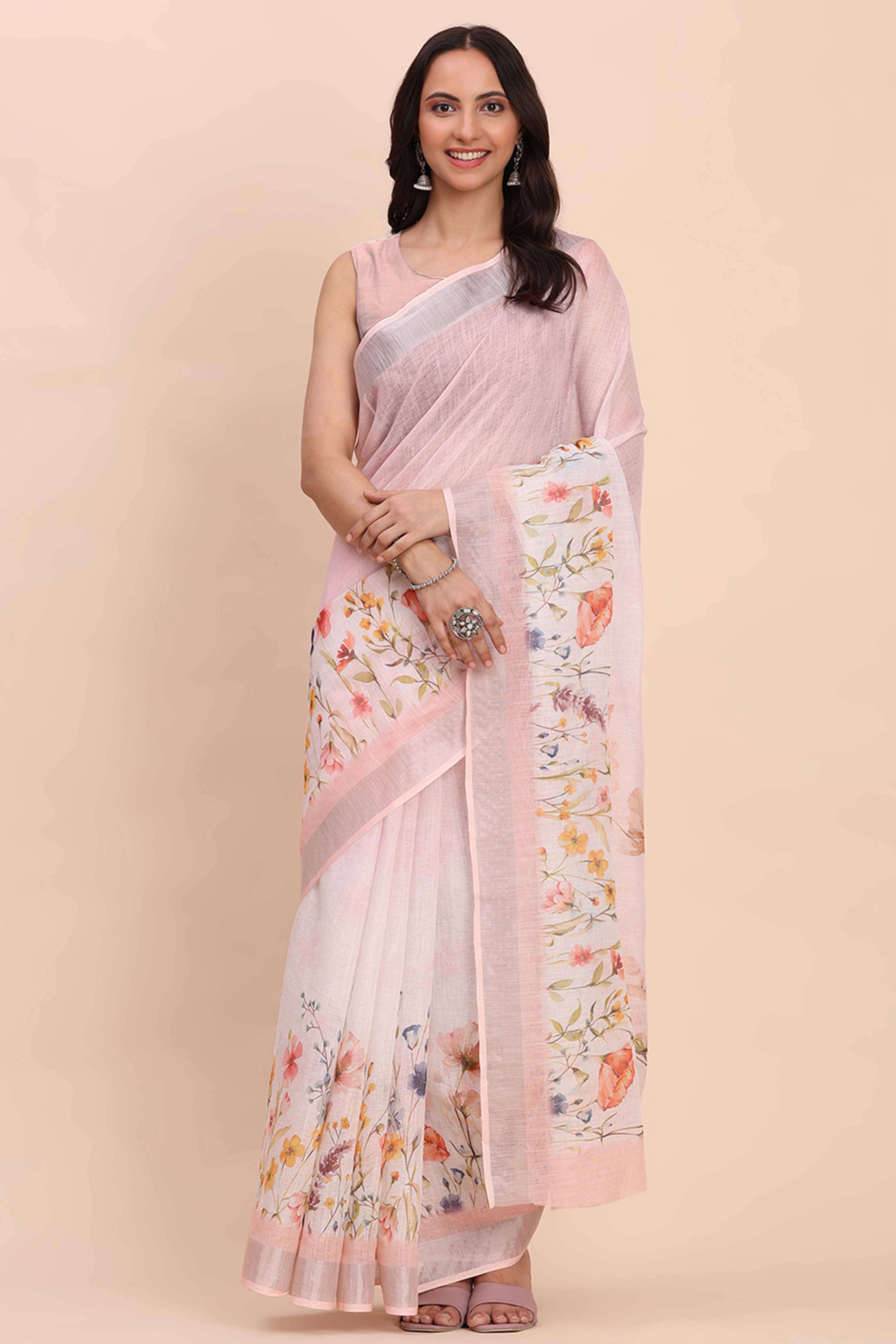 Light Pink Linen Cotton Saree Featuring Floral Prints & Woven Border