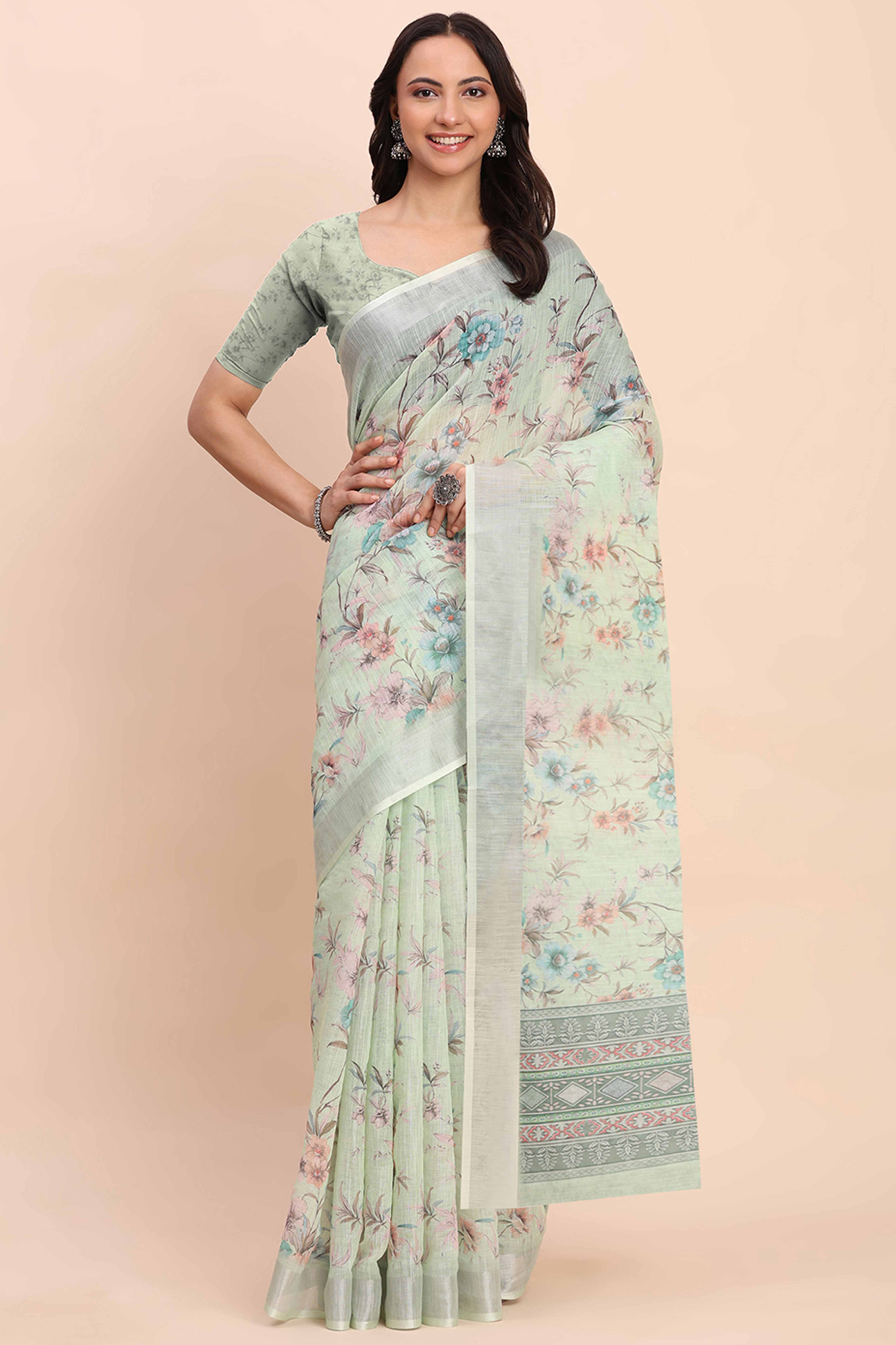 Light Green Linen Cotton Saree Featuring Floral Prints & Woven Border