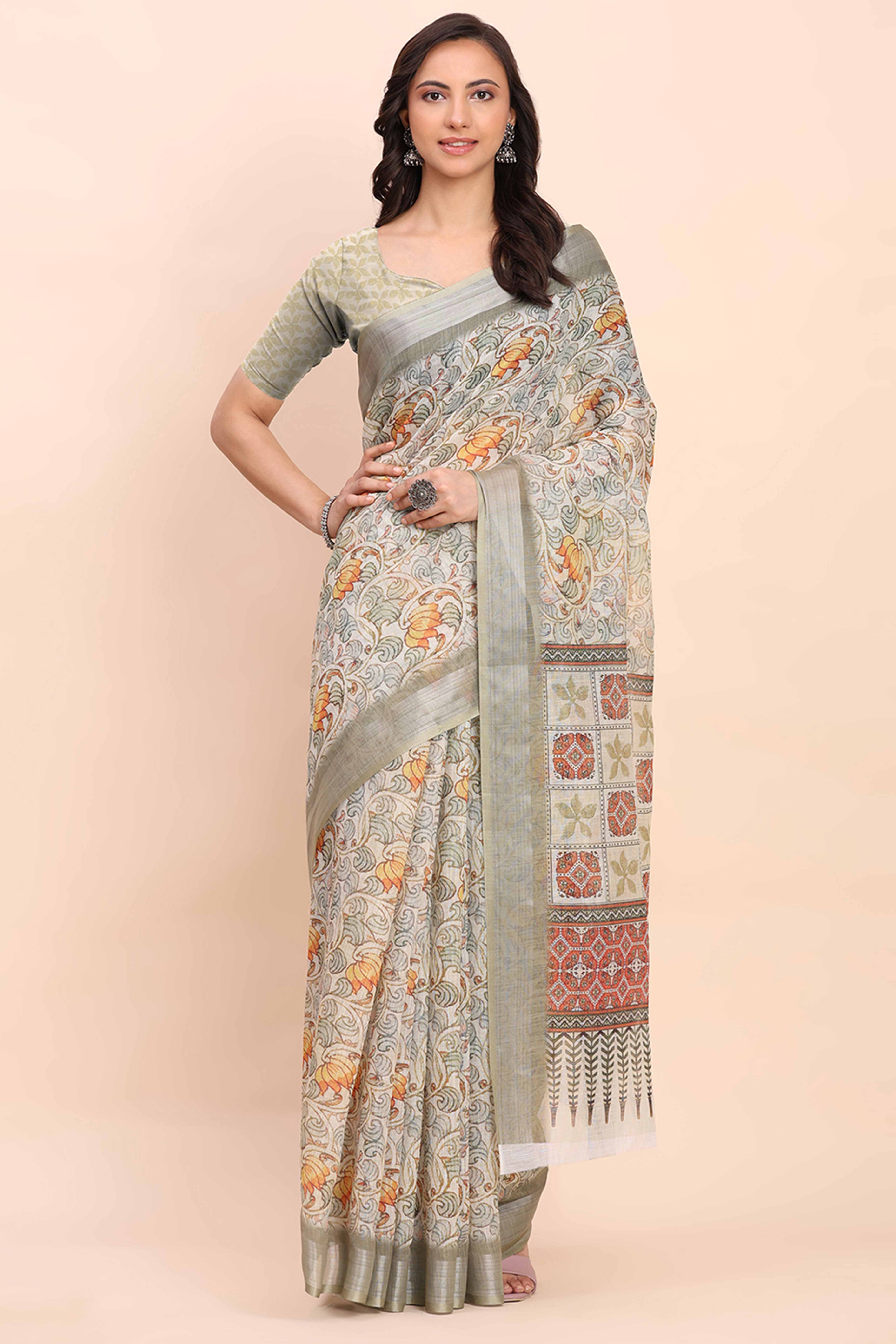 Light Green Linen Cotton Saree Featuring Floral Prints & Woven Border