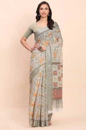 Light Green Linen Cotton Saree Featuring Floral Prints & Woven Border
