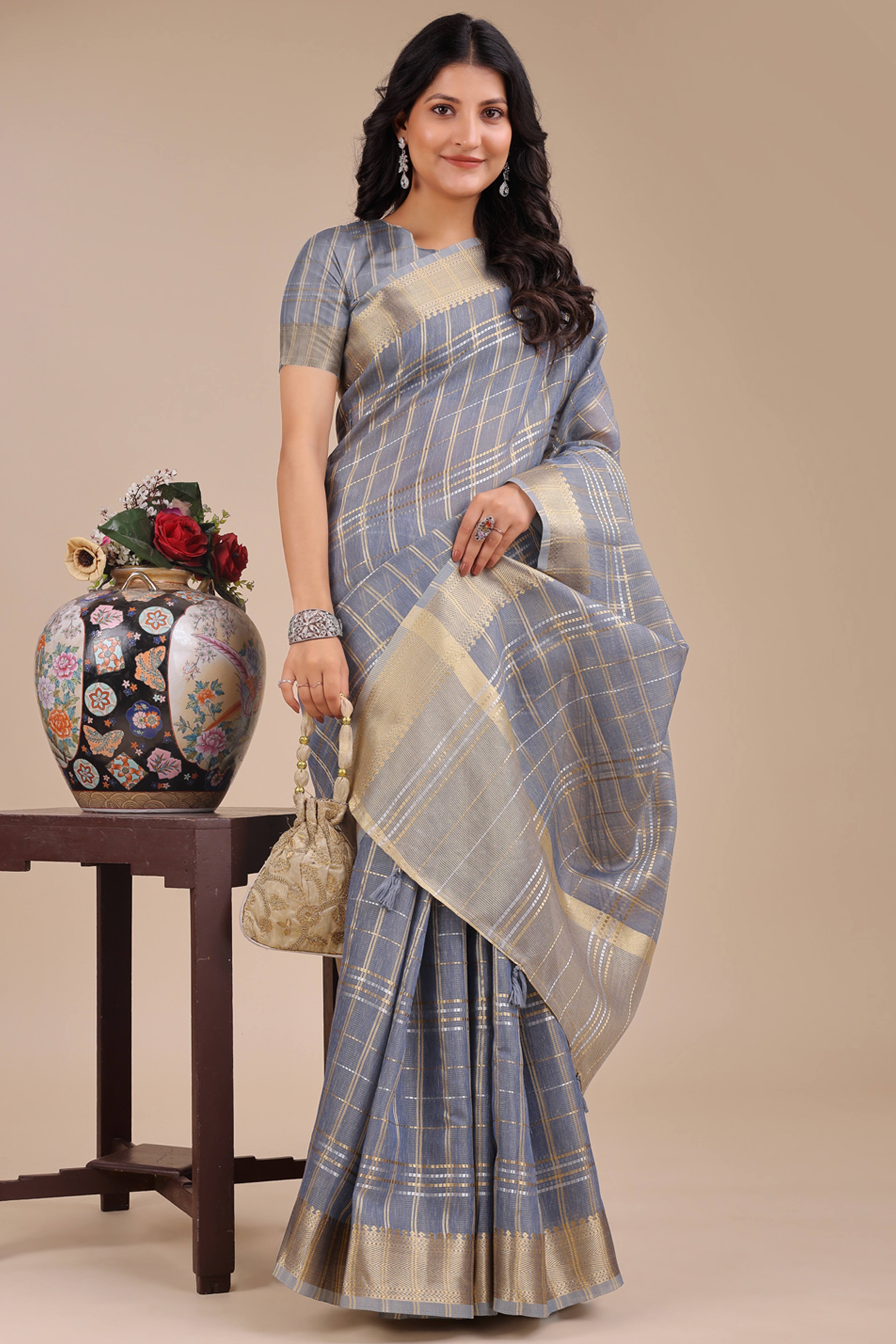 Sky Blue Organza Saree with Checkered Zari Weaving and Tassel Charm