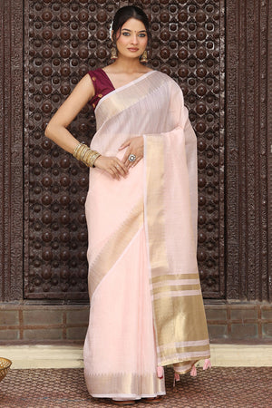 Charming Light Pink Zari Weaving Cotton Blend Saree Adorned With Stylish Tassel Detailing