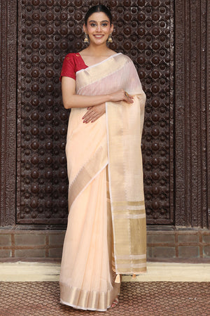 Charming Peach Zari Weaving Cotton Blend Saree Adorned With Stylish Tassel Detailing