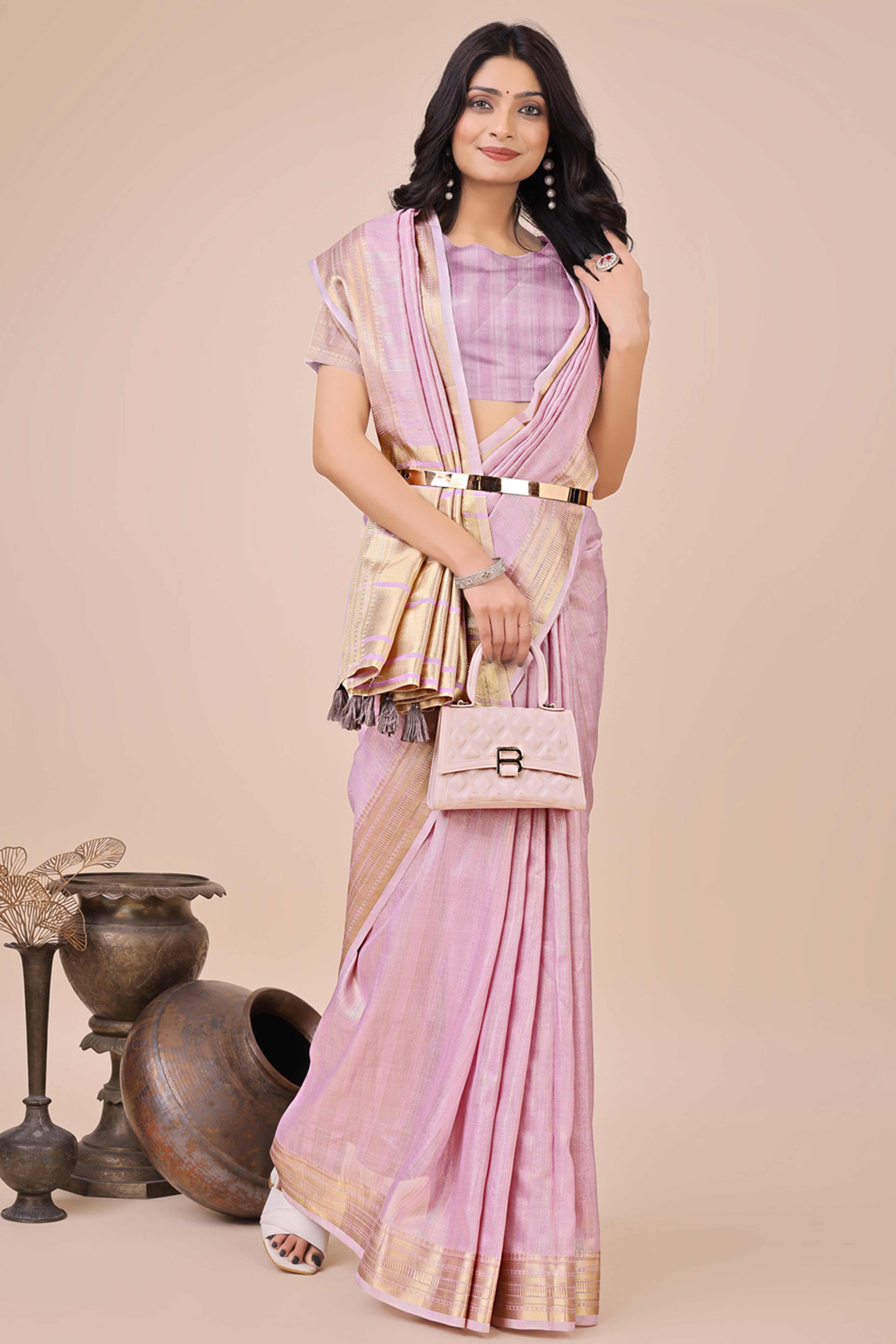 Onion Pink Organza Saree With Intricate Weave & Elegant Tassel Accents