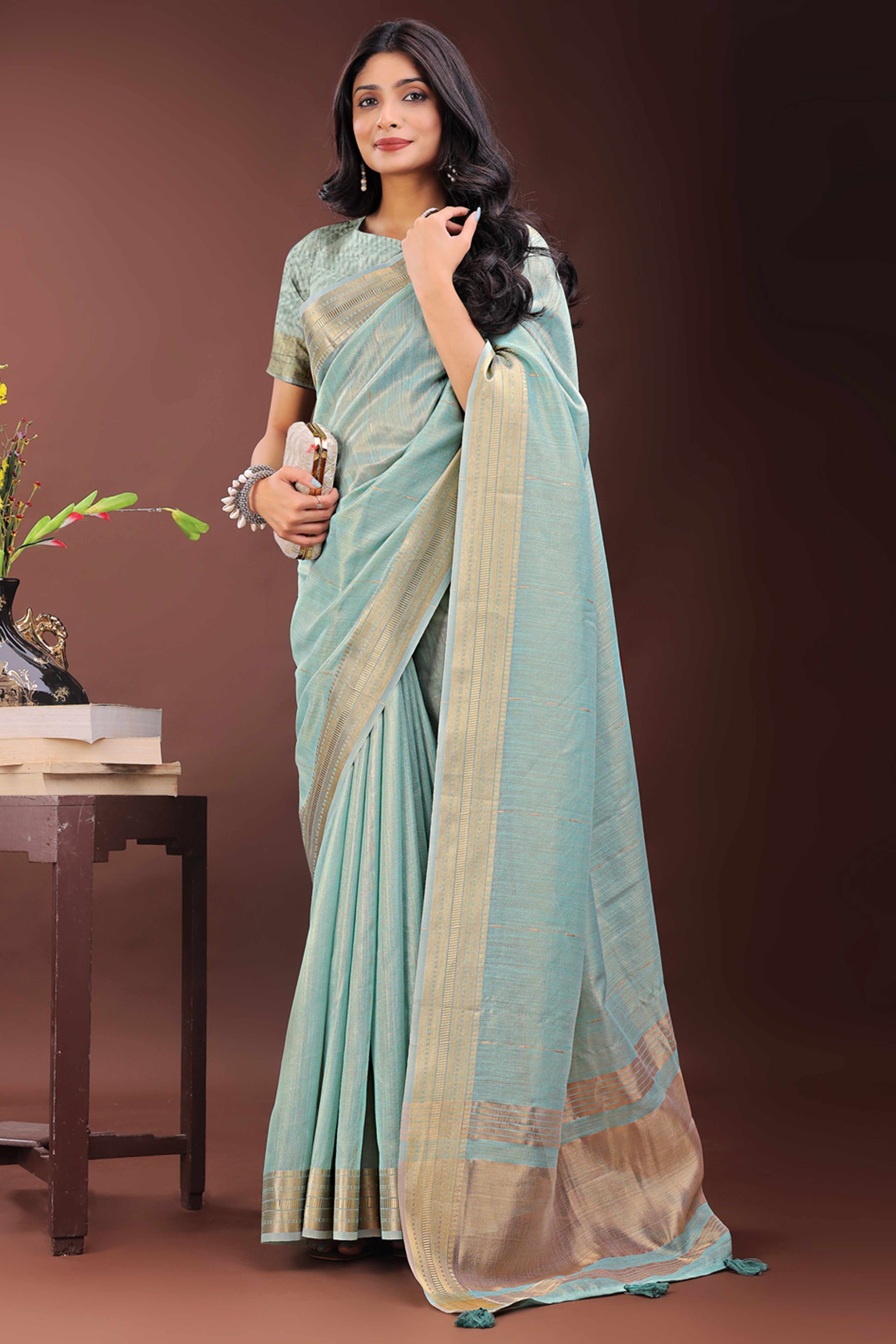Blue Organza Saree Adorned With Zari Weave & Tassel Edges