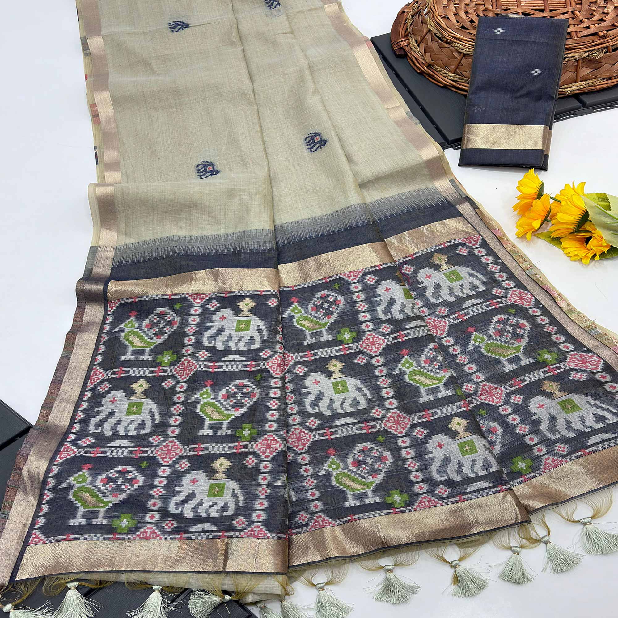 Beige Muga Cotton Silk Saree with Traditional Patola Woven Pallu Design