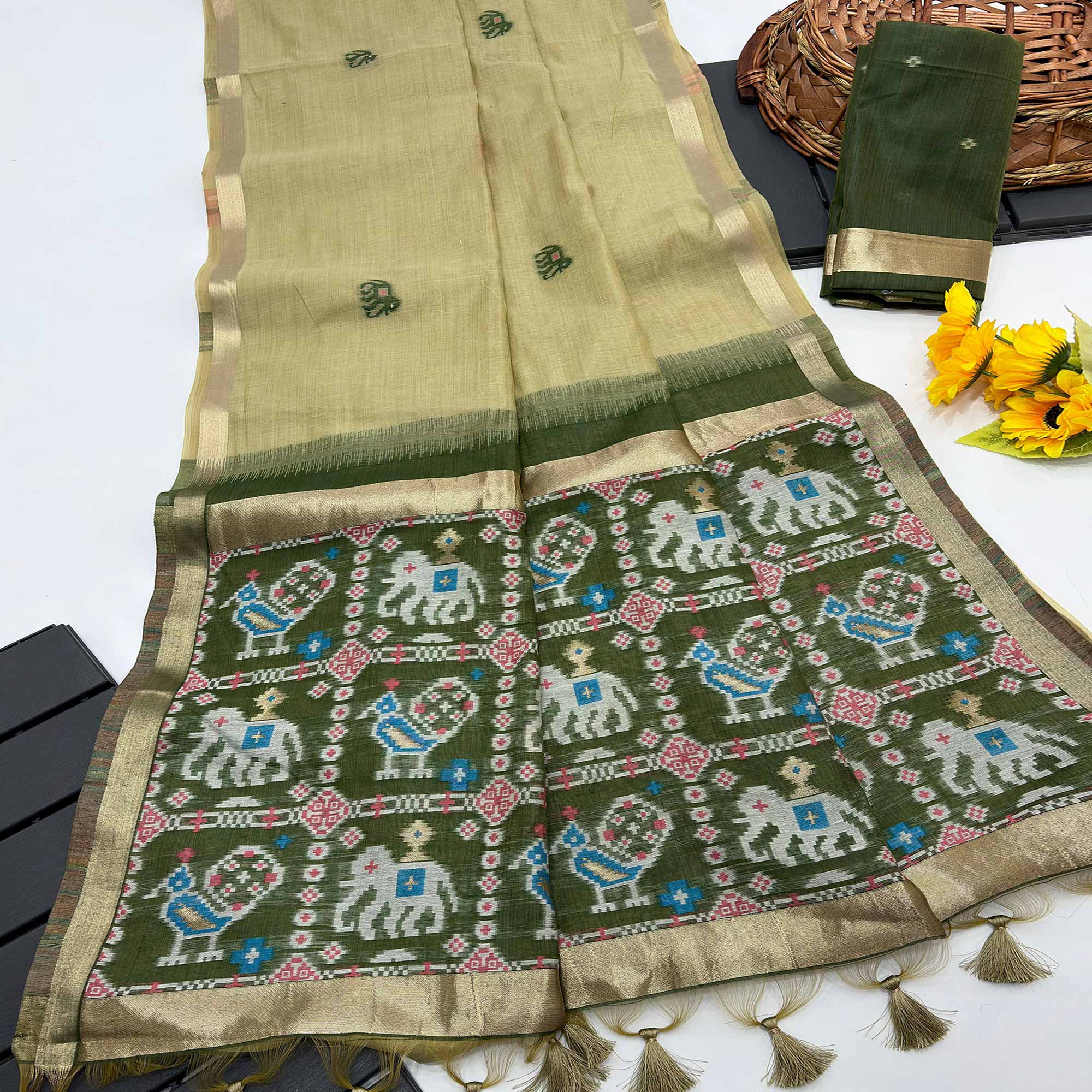 Green Muga Cotton Silk Saree with Traditional Patola Woven Pallu Design