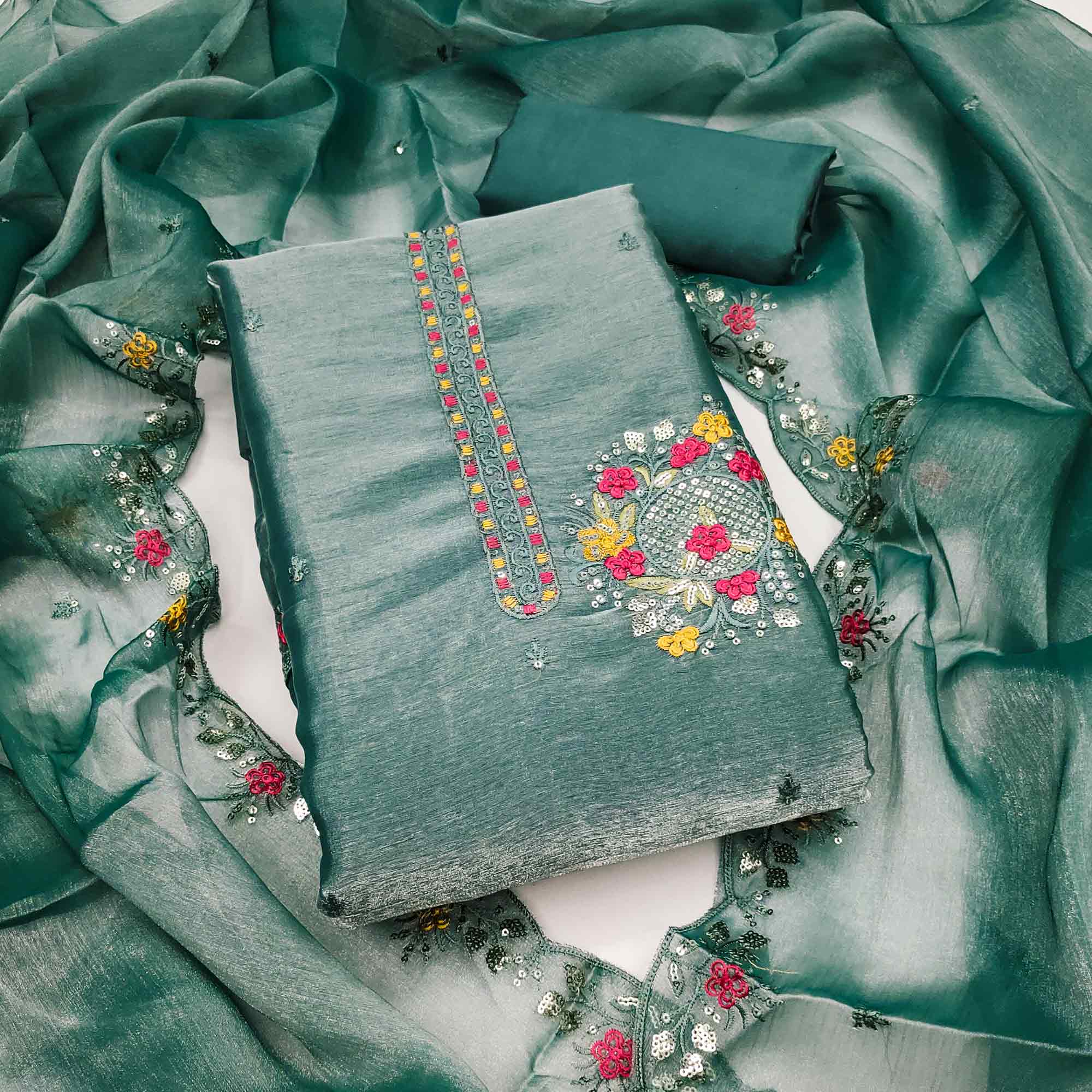 Graceful Rama Green Silk Blend Dress Material Featuring Exquisite Floral Embroidery & Sequin Accent