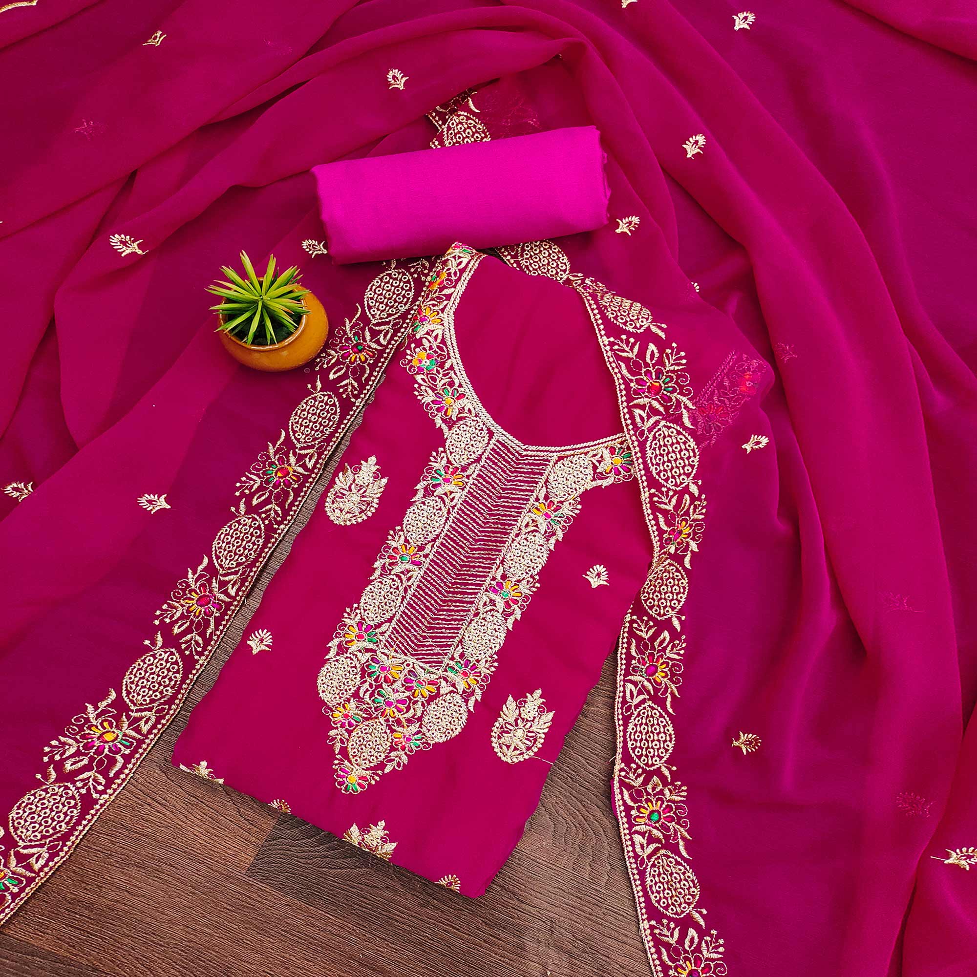 Rani Pink Designer Georgette Dress Material Adorned With Intricate Floral Embroidery