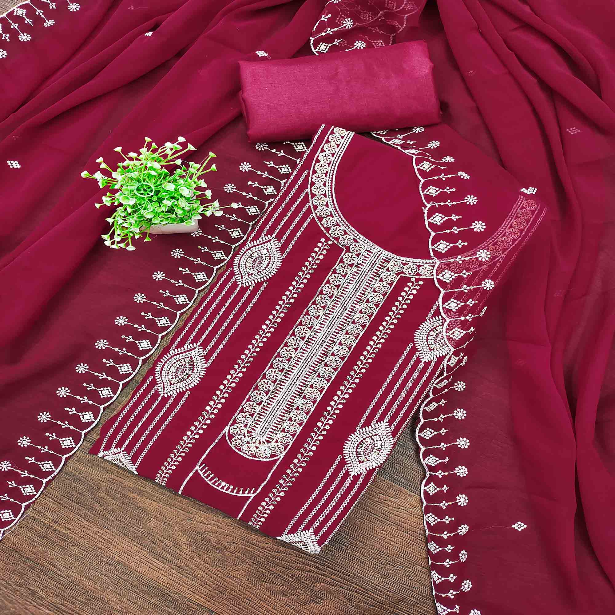 Pink Star Georgette Suit Fabric Highlighted with Fine Thread Embroidery Work