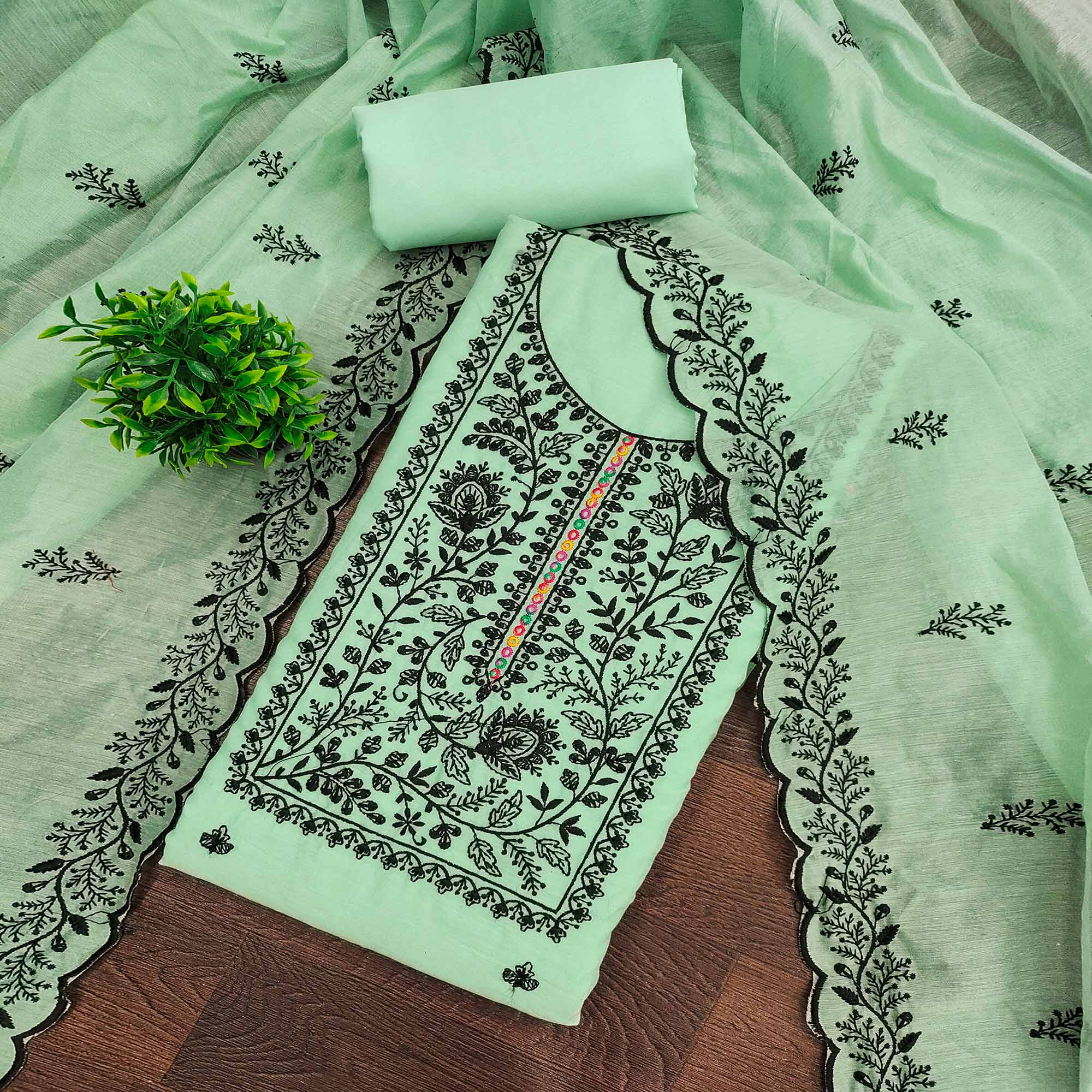 Sea Green Chanderi Cotton Dress Material Accented With Delicate Floral Thread Work