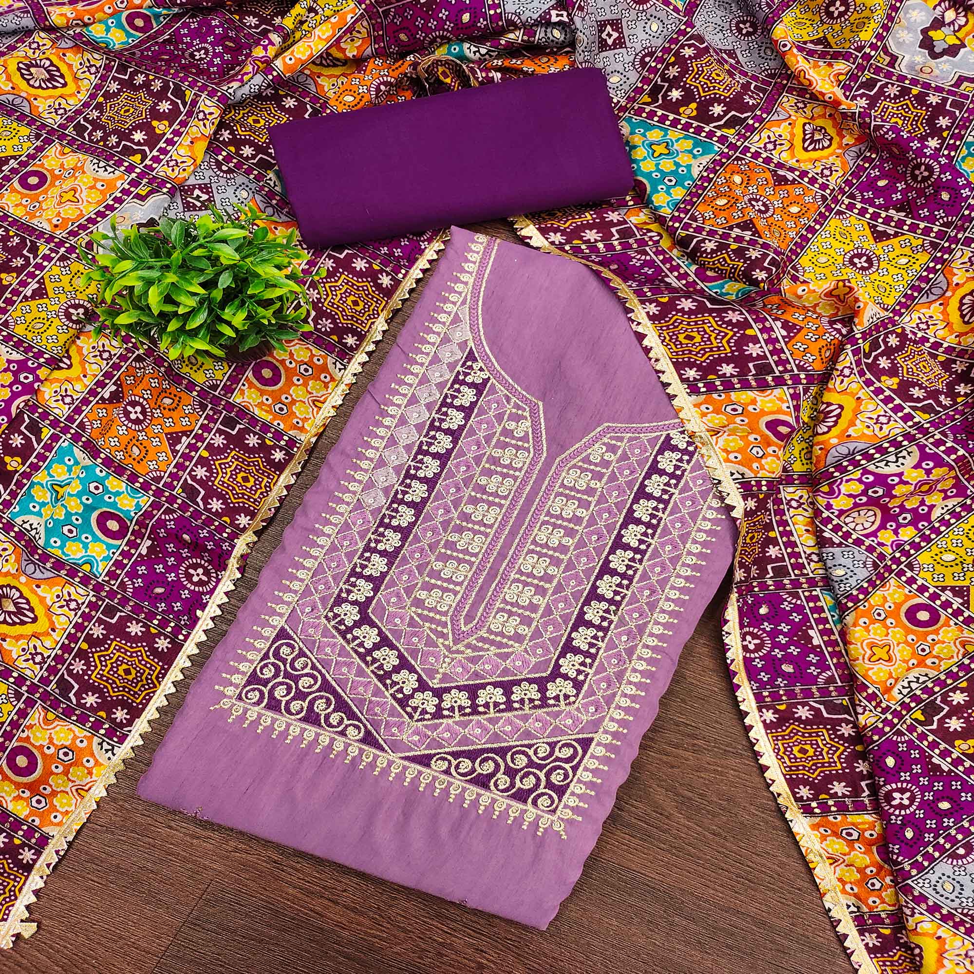 Stylish Purple Cotton Blend Dress Material Enriched With Floral Embroidery & Sequins Work