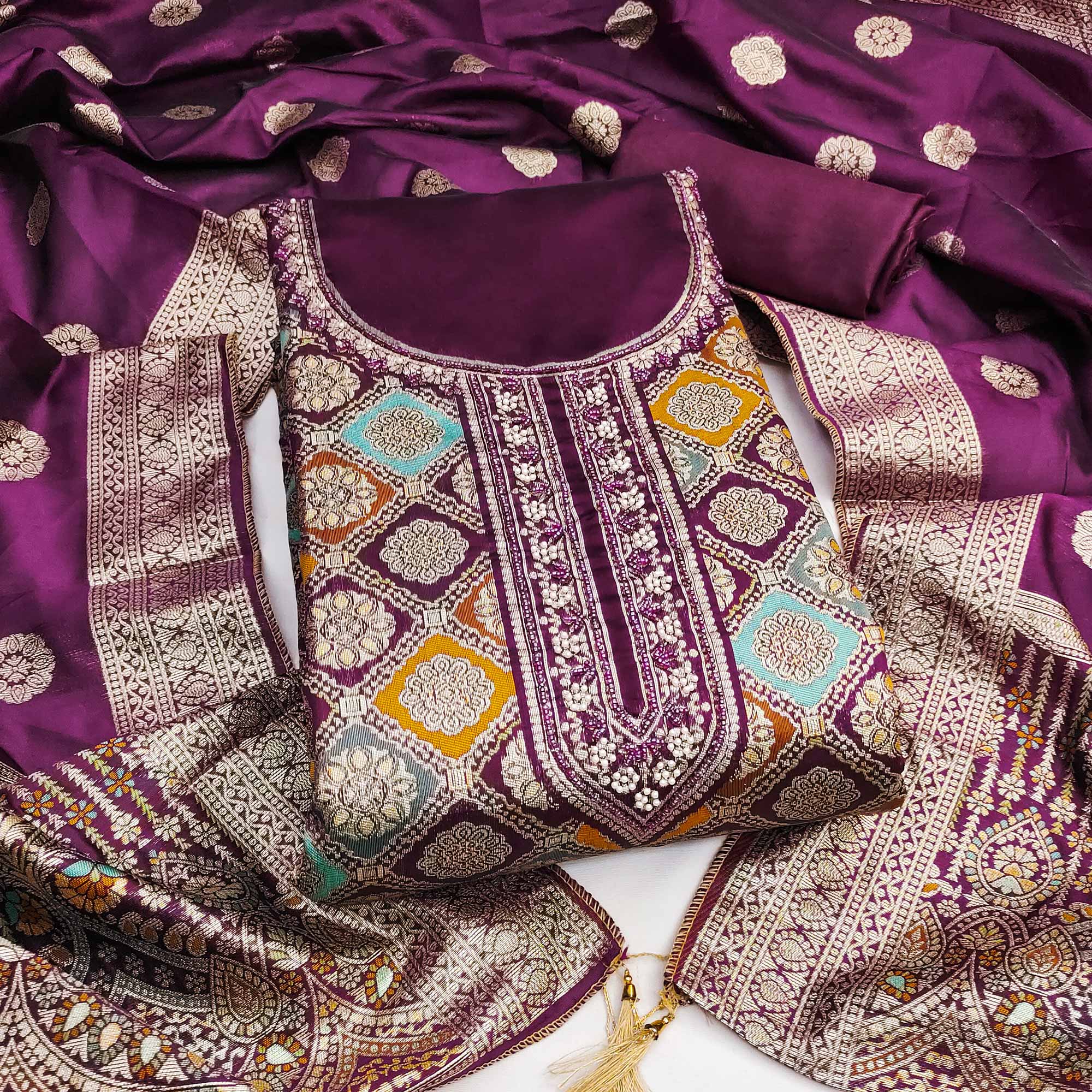 Wine Unstitched Dress Material in Zari Woven Jacquard