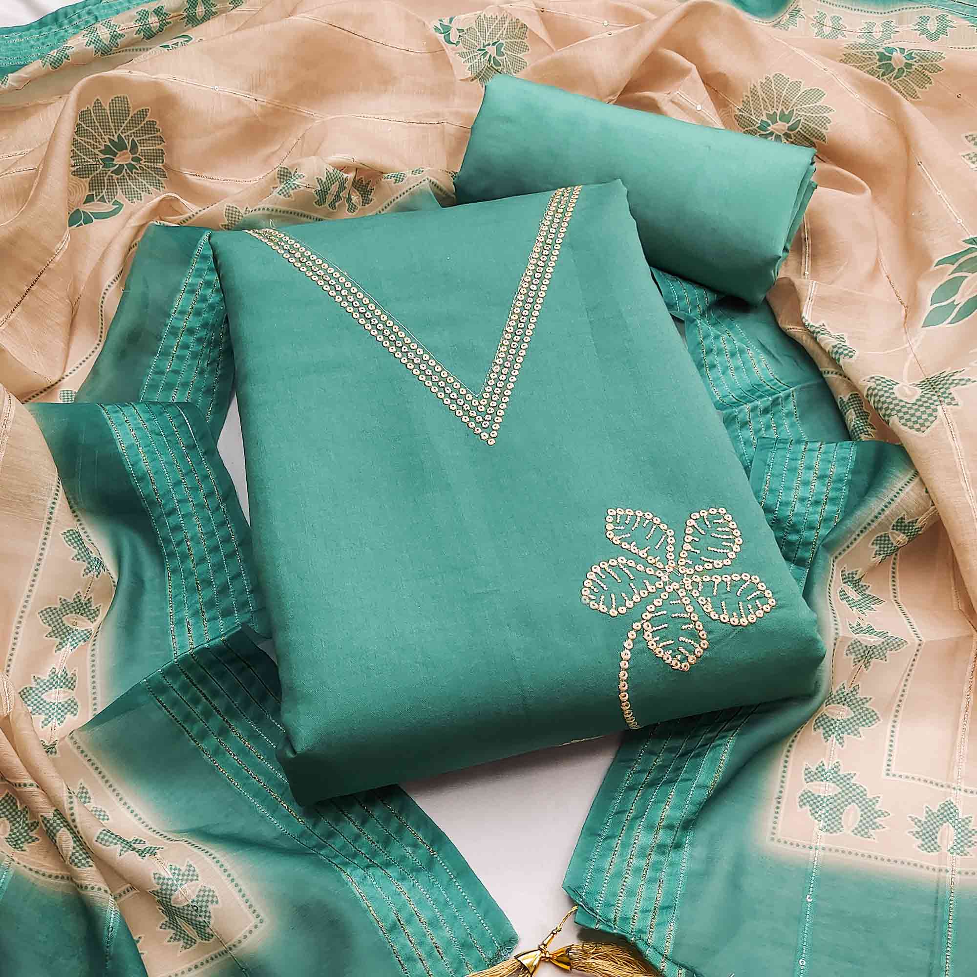 Sophisticated Turquoise Floral Embroidered Roman Cotton Silk Dress Material With Shimmering Sequins