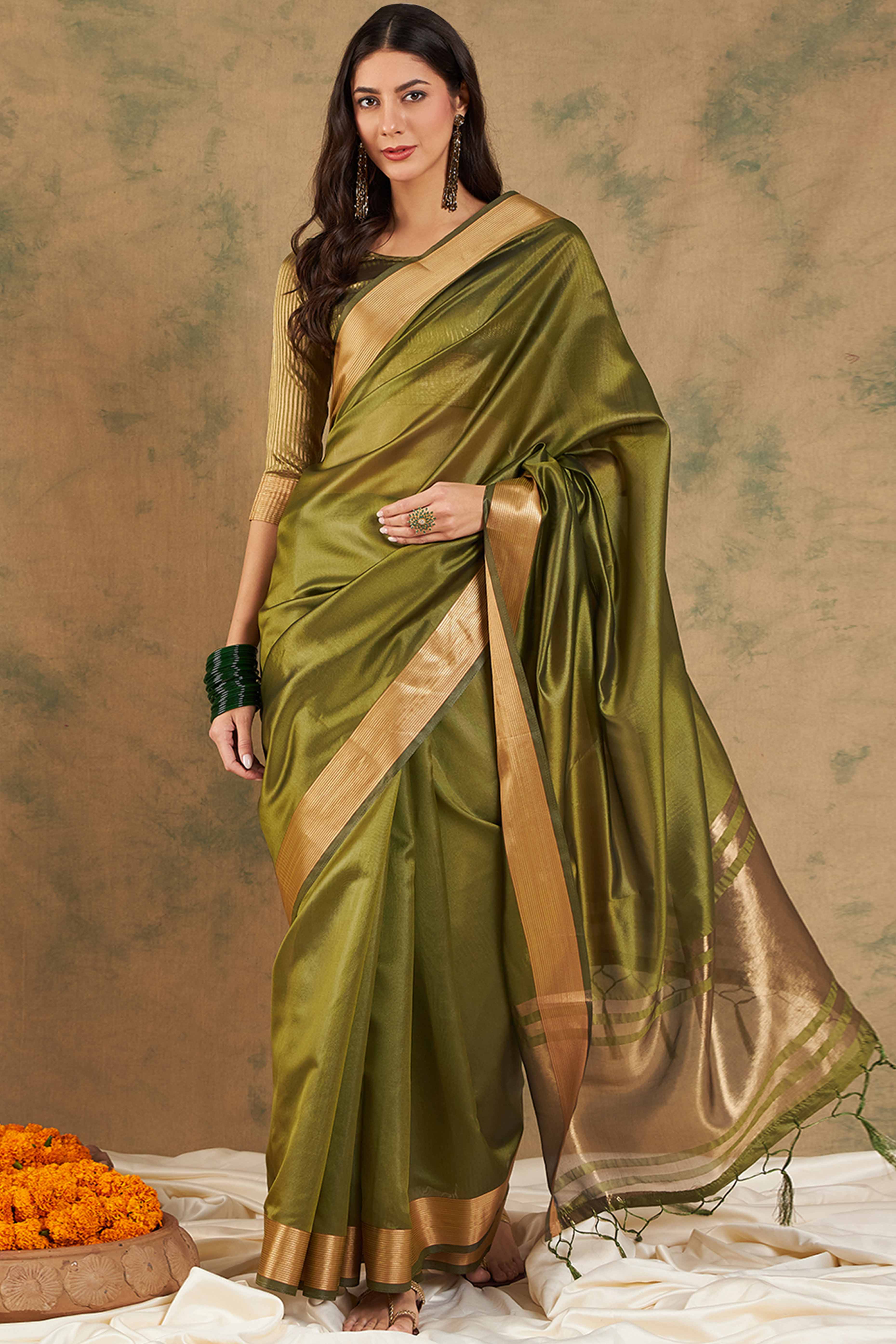 Green Organza Saree In Organza With Delicate Weaving Border And Tassel Details