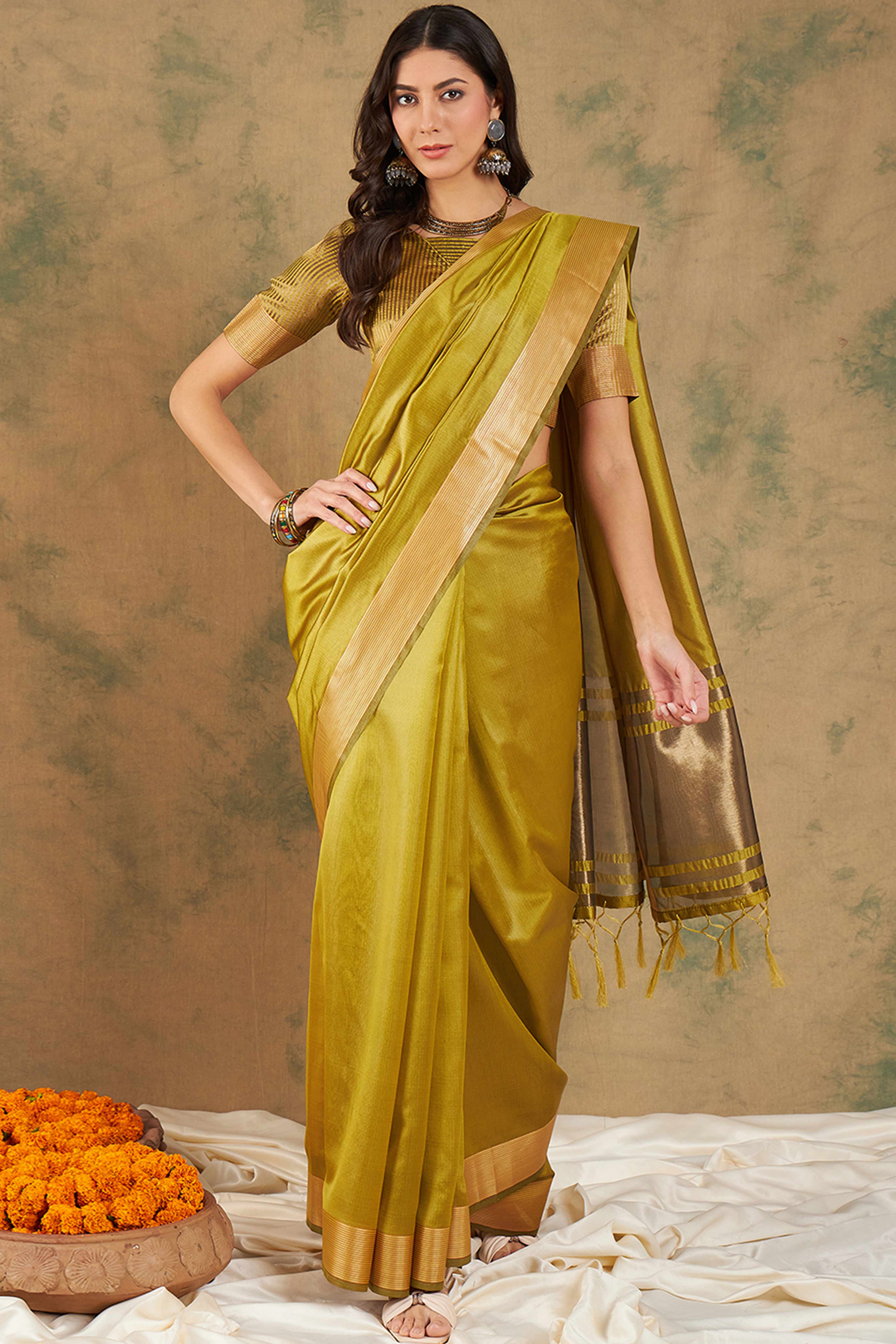 Olive Green Organza Saree In Organza With Delicate Weaving Border And Tassel Details